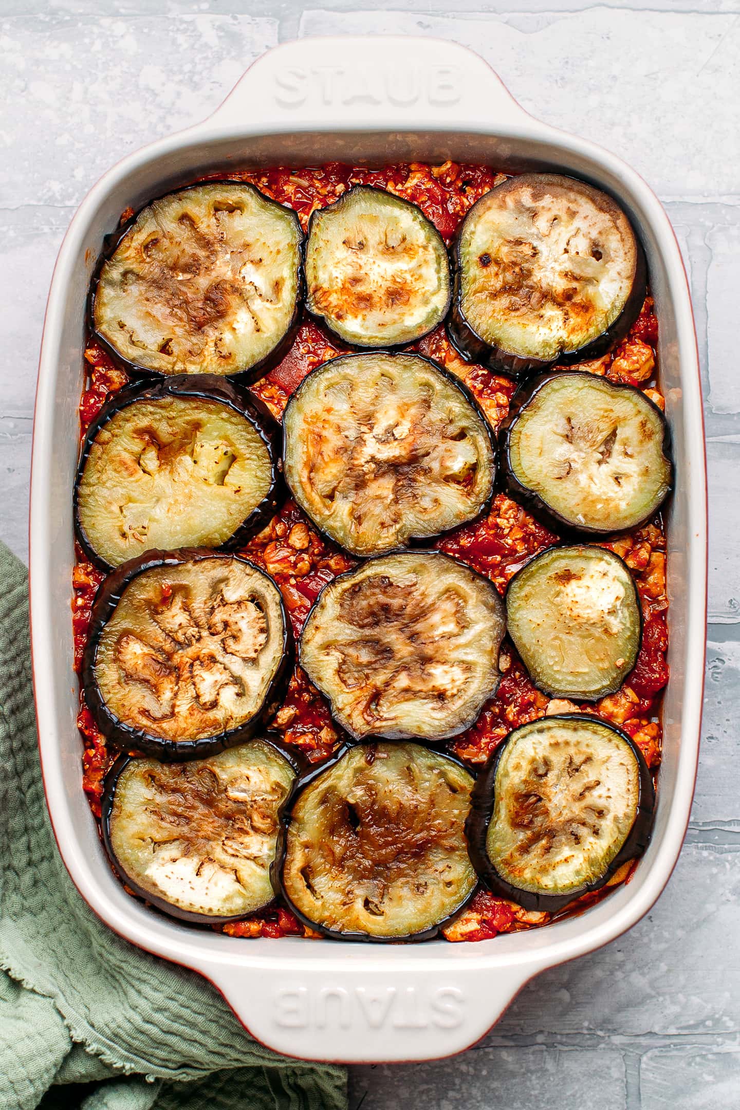 Tomato filling topped with sautéed eggplant slices.