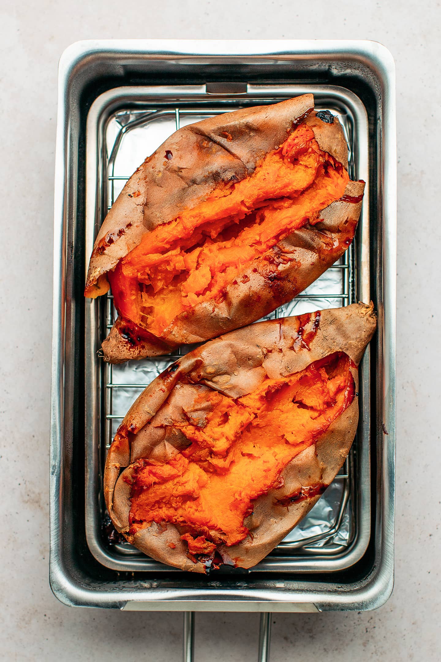 Baked sweet potatoes in a stovetop smoker.