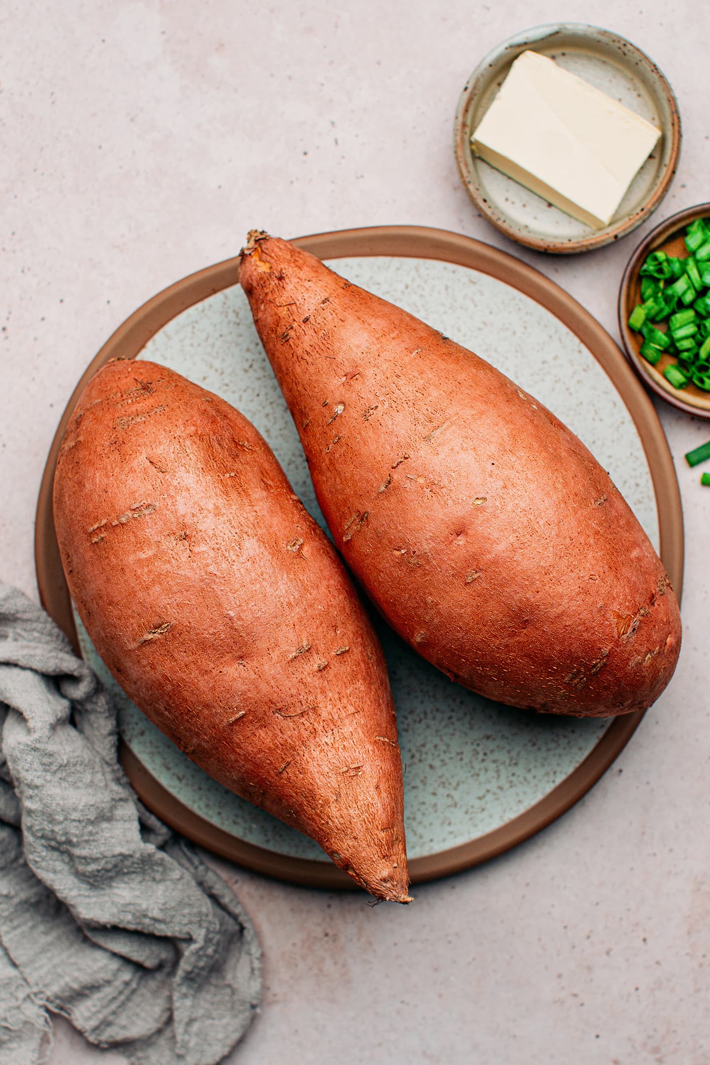 Ingredients like sweet potatoes, butter, and green onions.