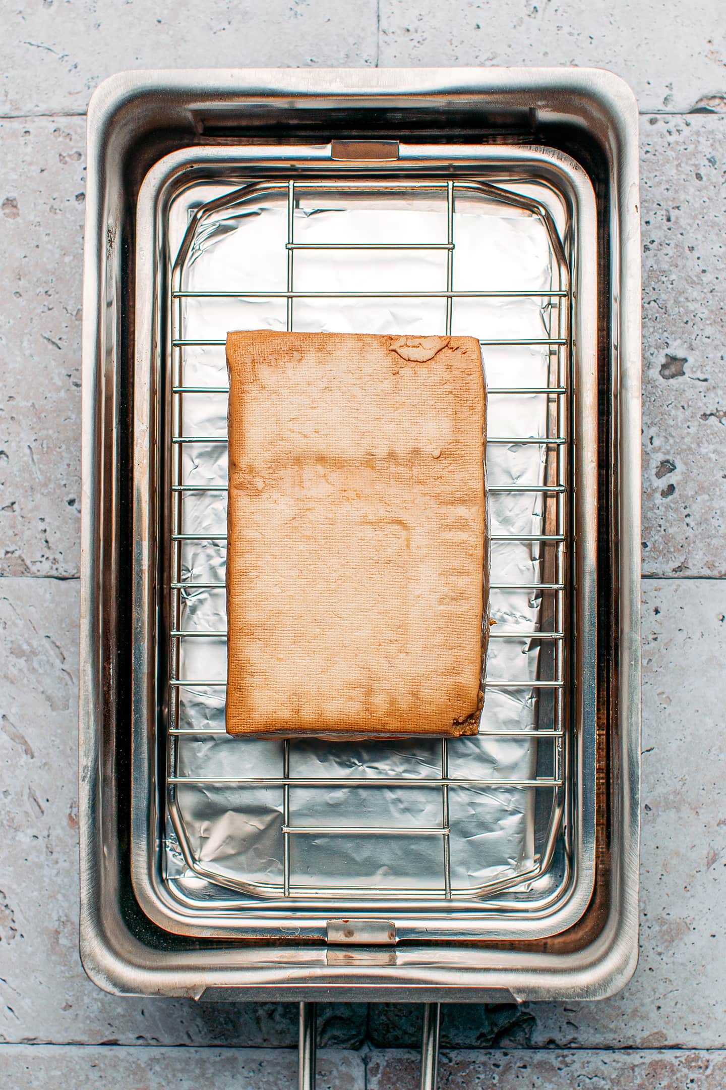 Marinated tofu in a stovetop smoker.