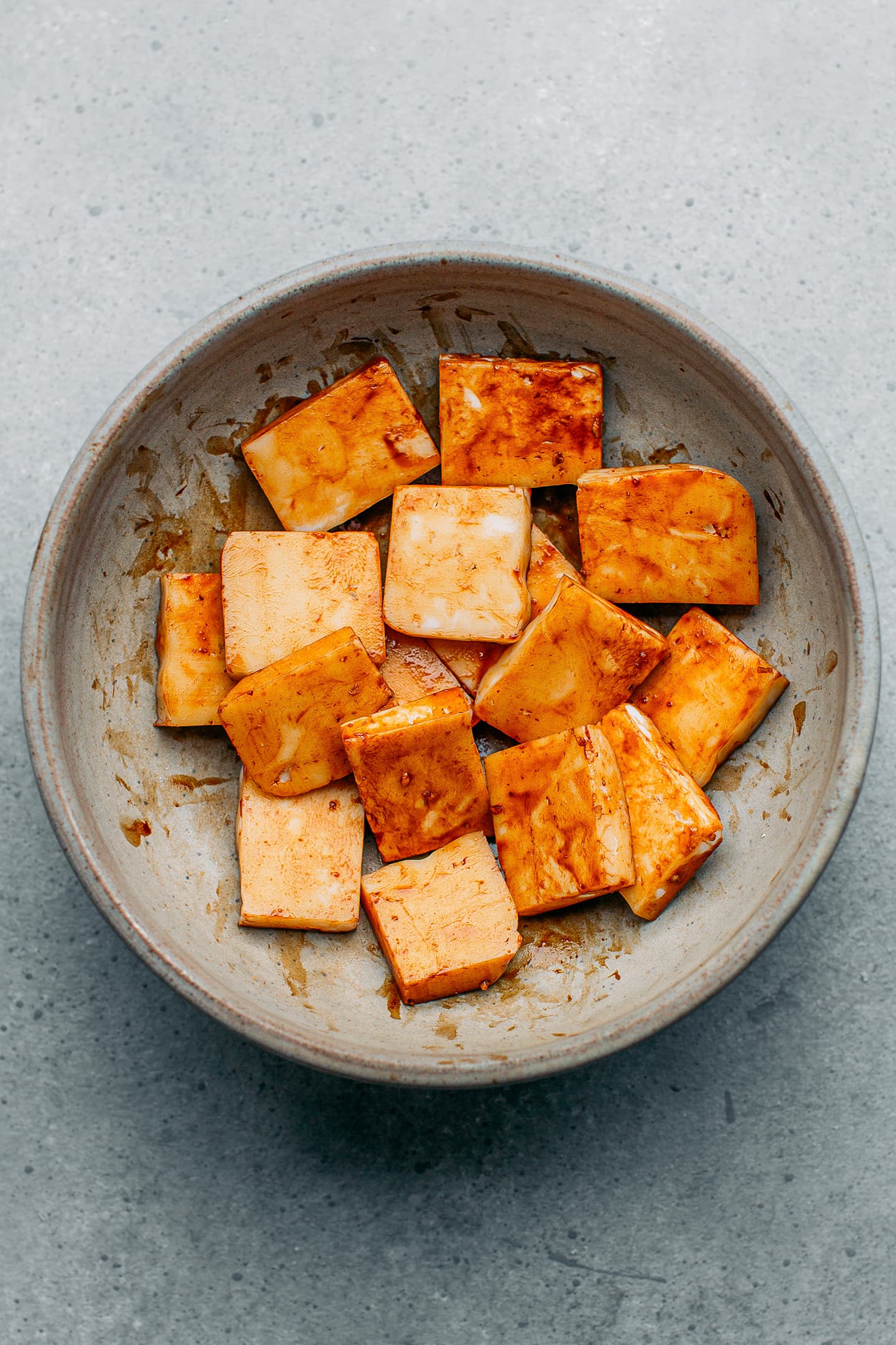 Bot chien coated with soy sauce in a bowl.