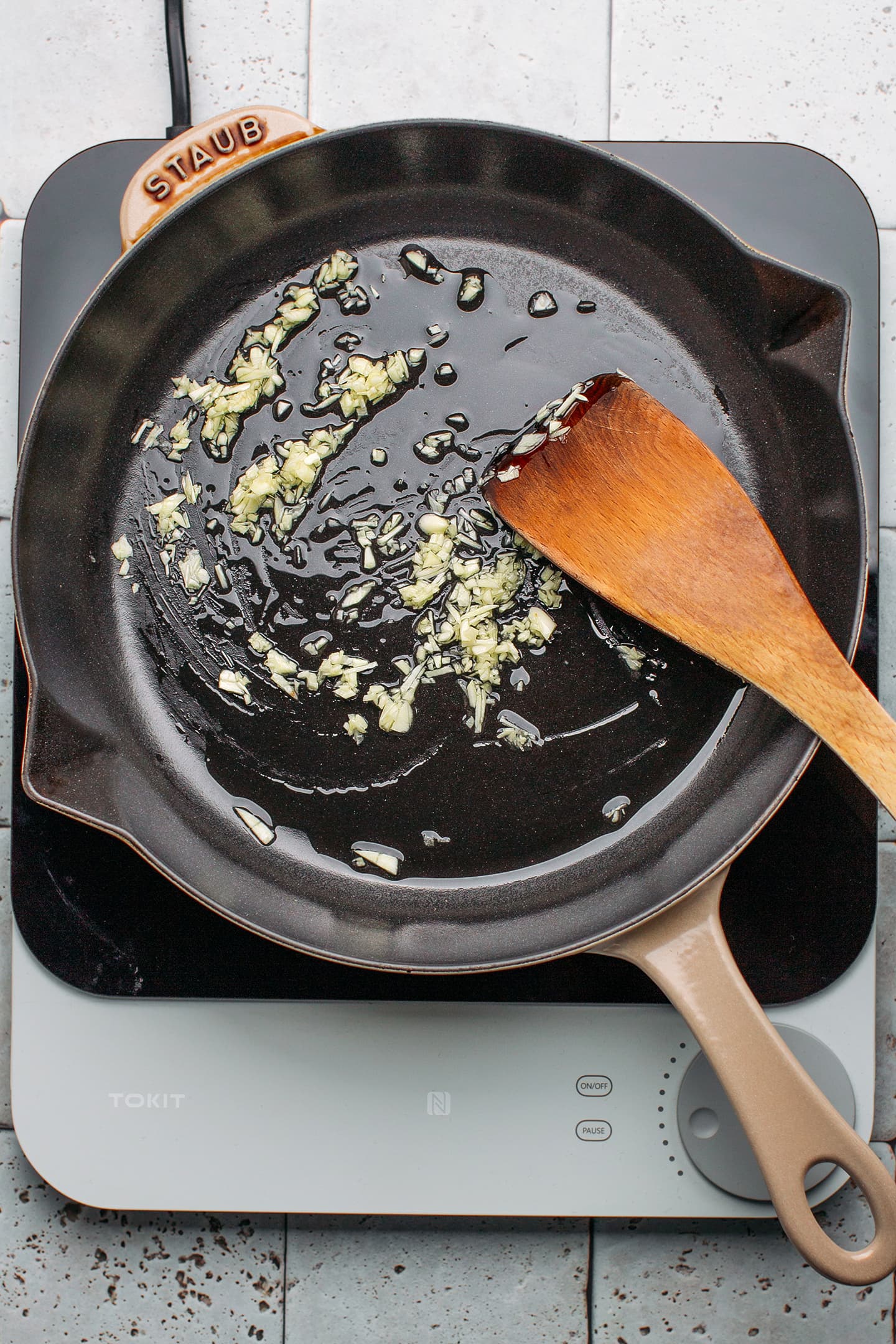 Sautéed garlic in a skillet.