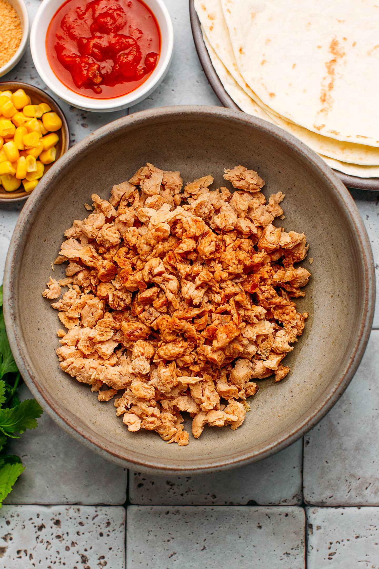 Soy curls and soy sauce in a bowl.