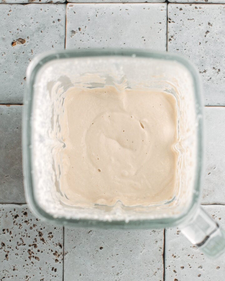 Cashew cream in a blender.