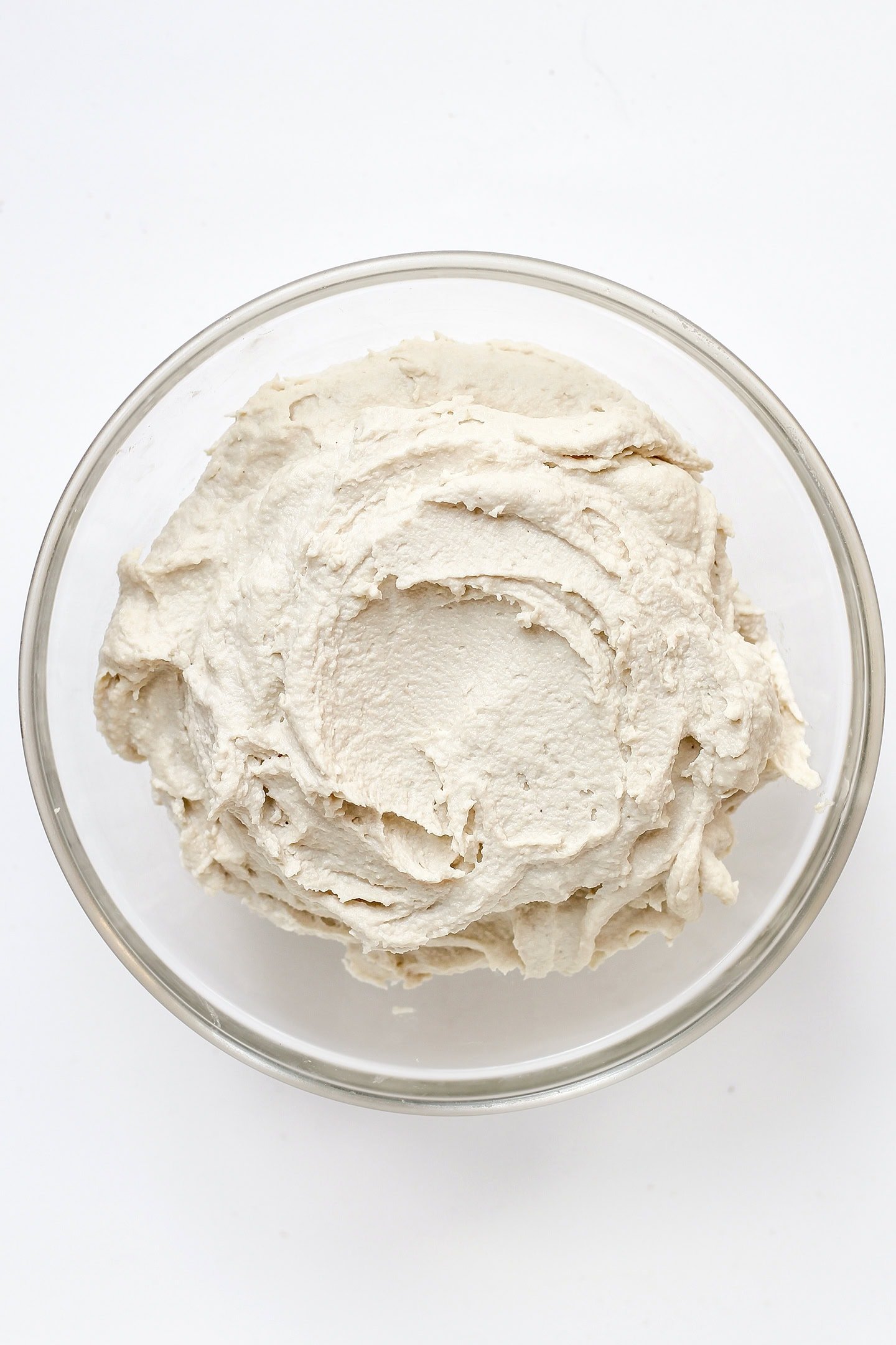 Cashew cream in a glass bowl.