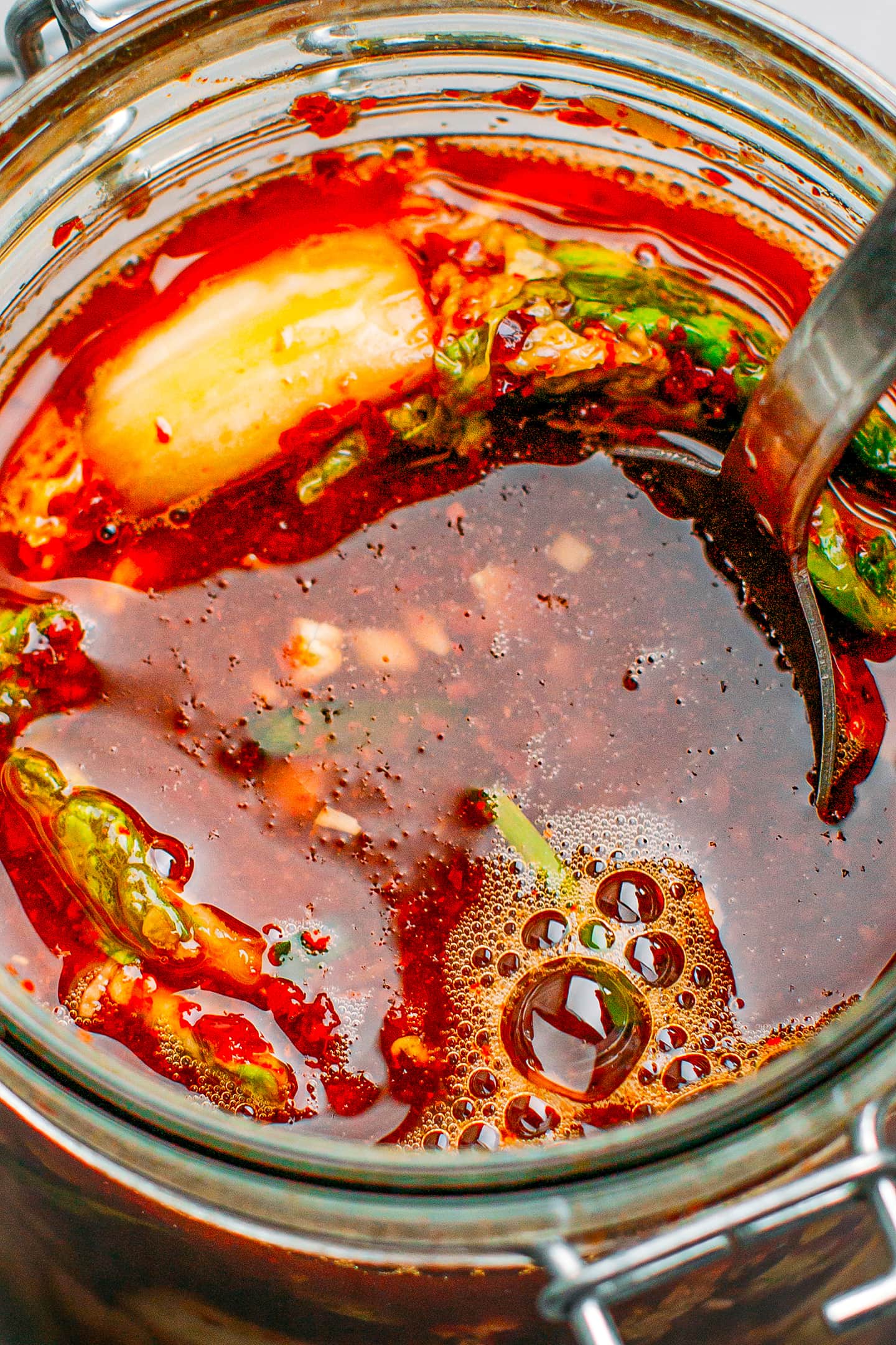 Close-up of kimchi with bubbles.