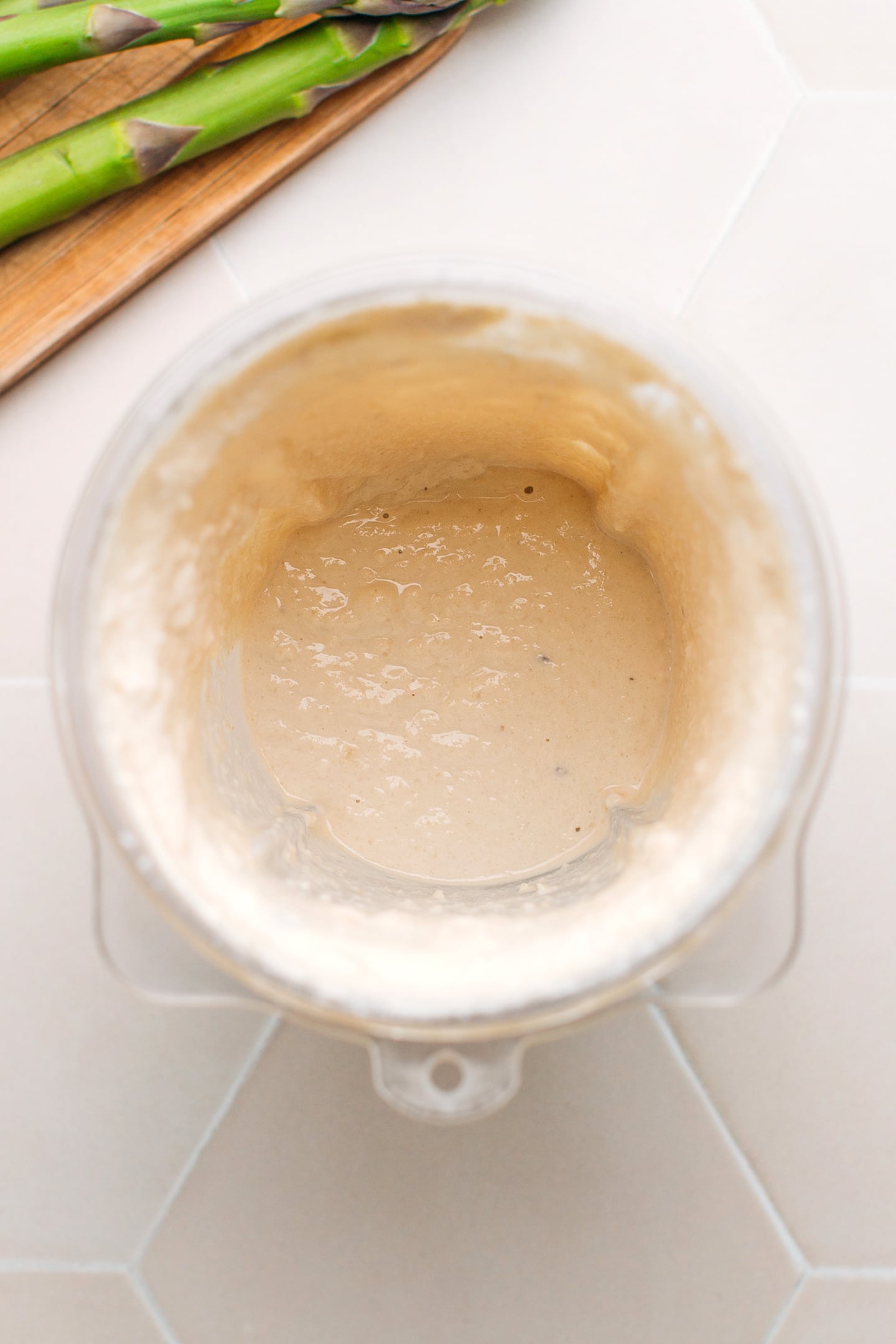 Blended cashew cream in a blender.