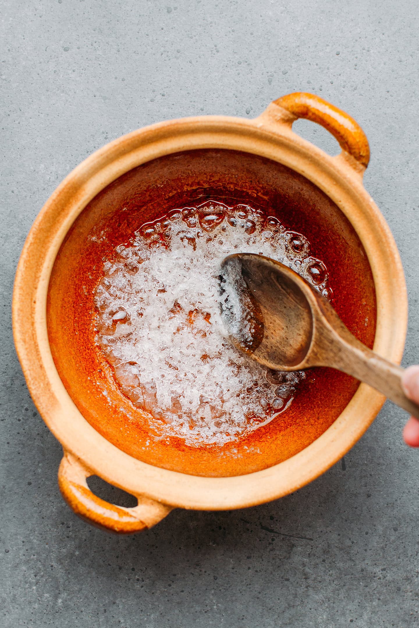 Crystallized sugar in a clay pot.