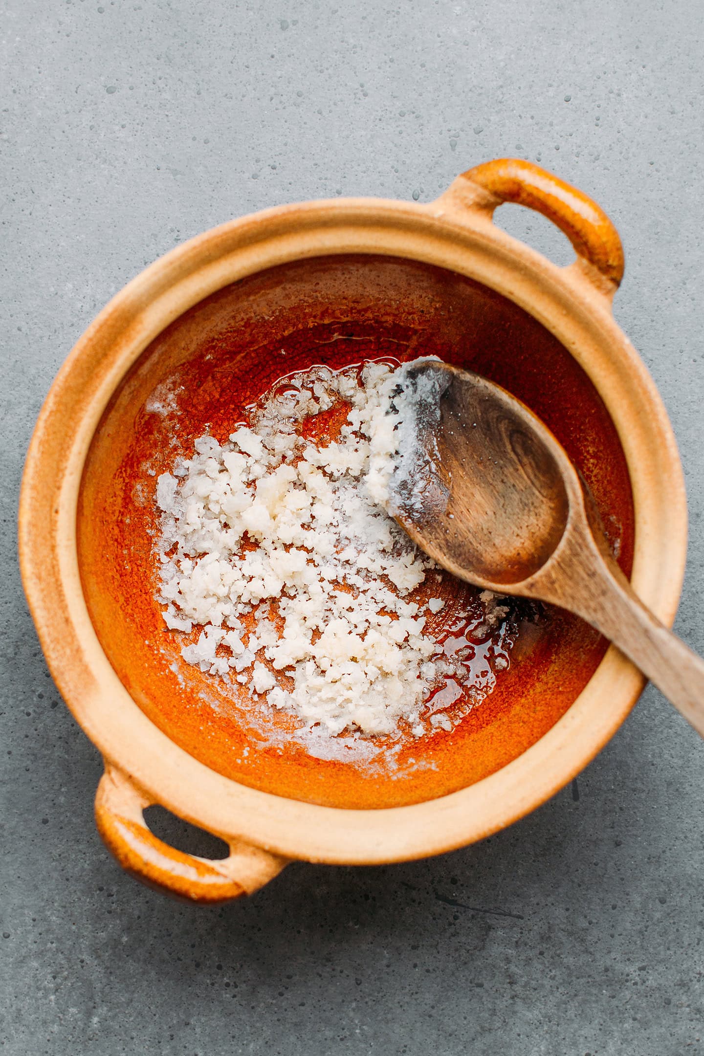 Crystallized sugar in a clay pot.