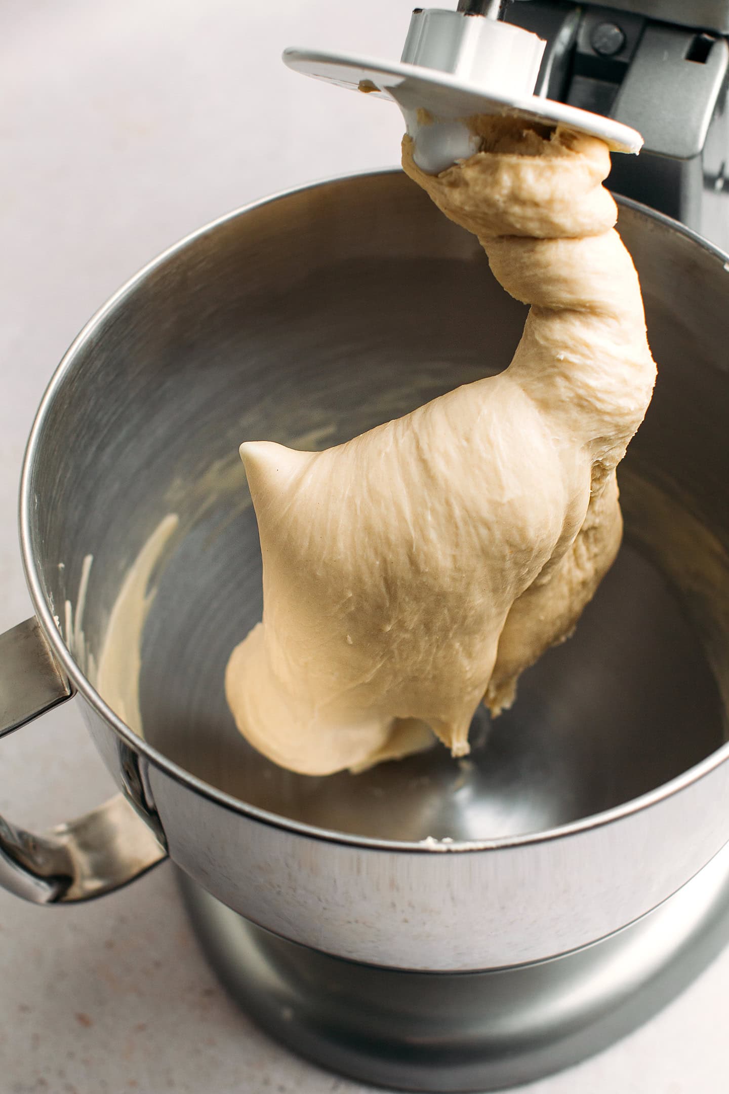 Brioche dough in a stand mixer.