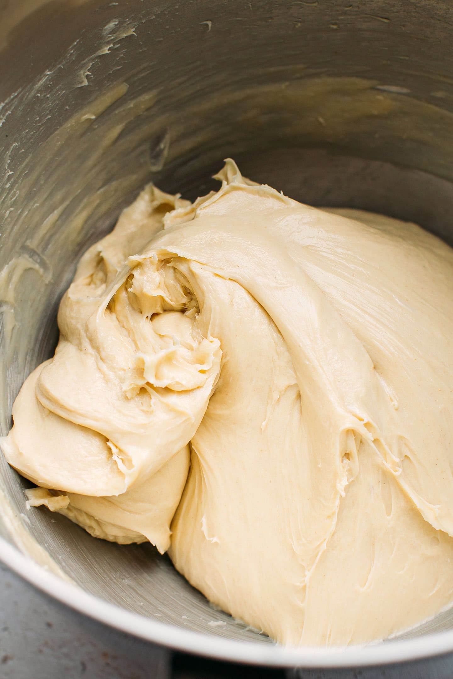 Close-up of a smooth and stretchy brioche dough.