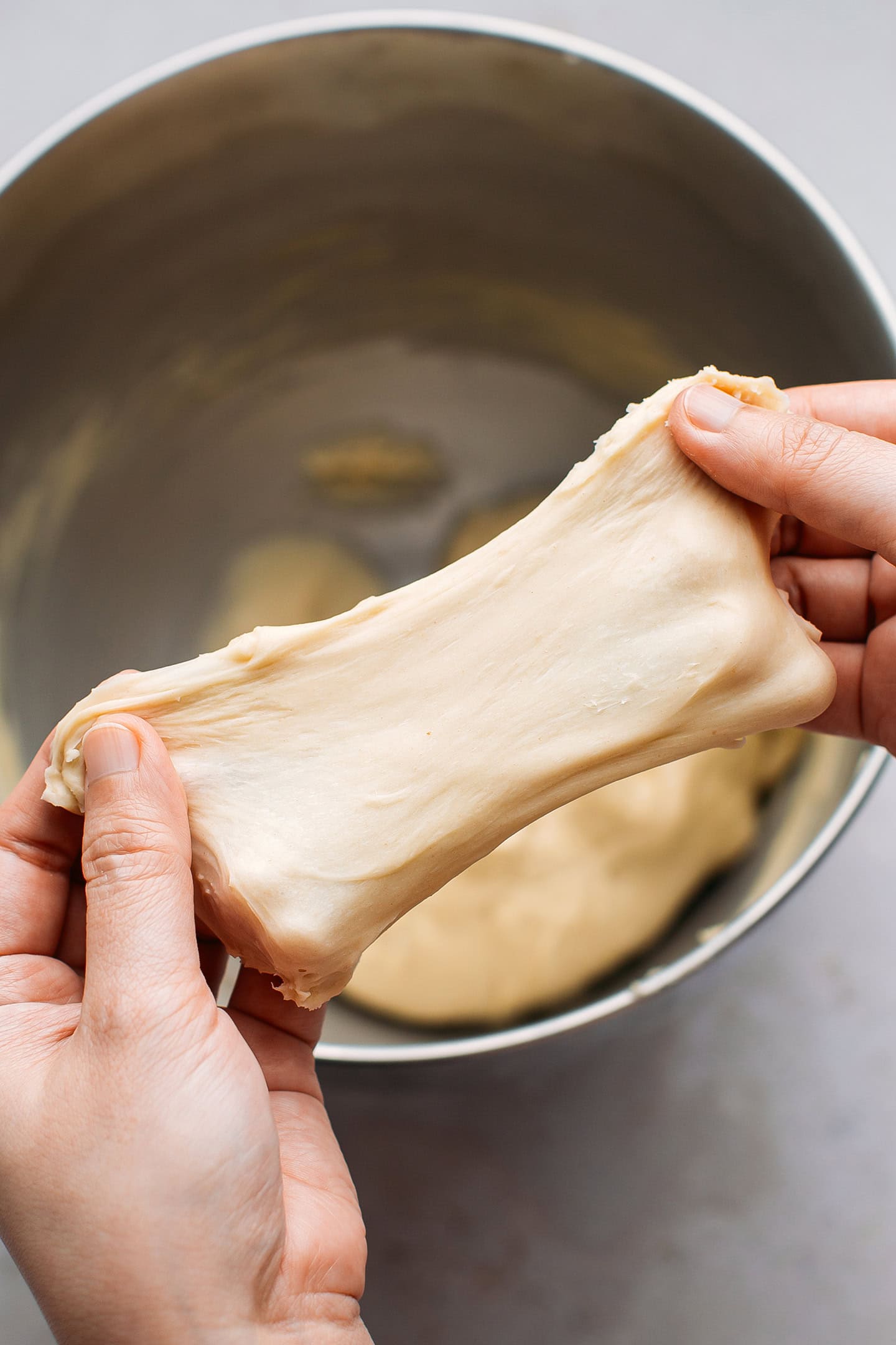 Window pan test with a piece of dough.