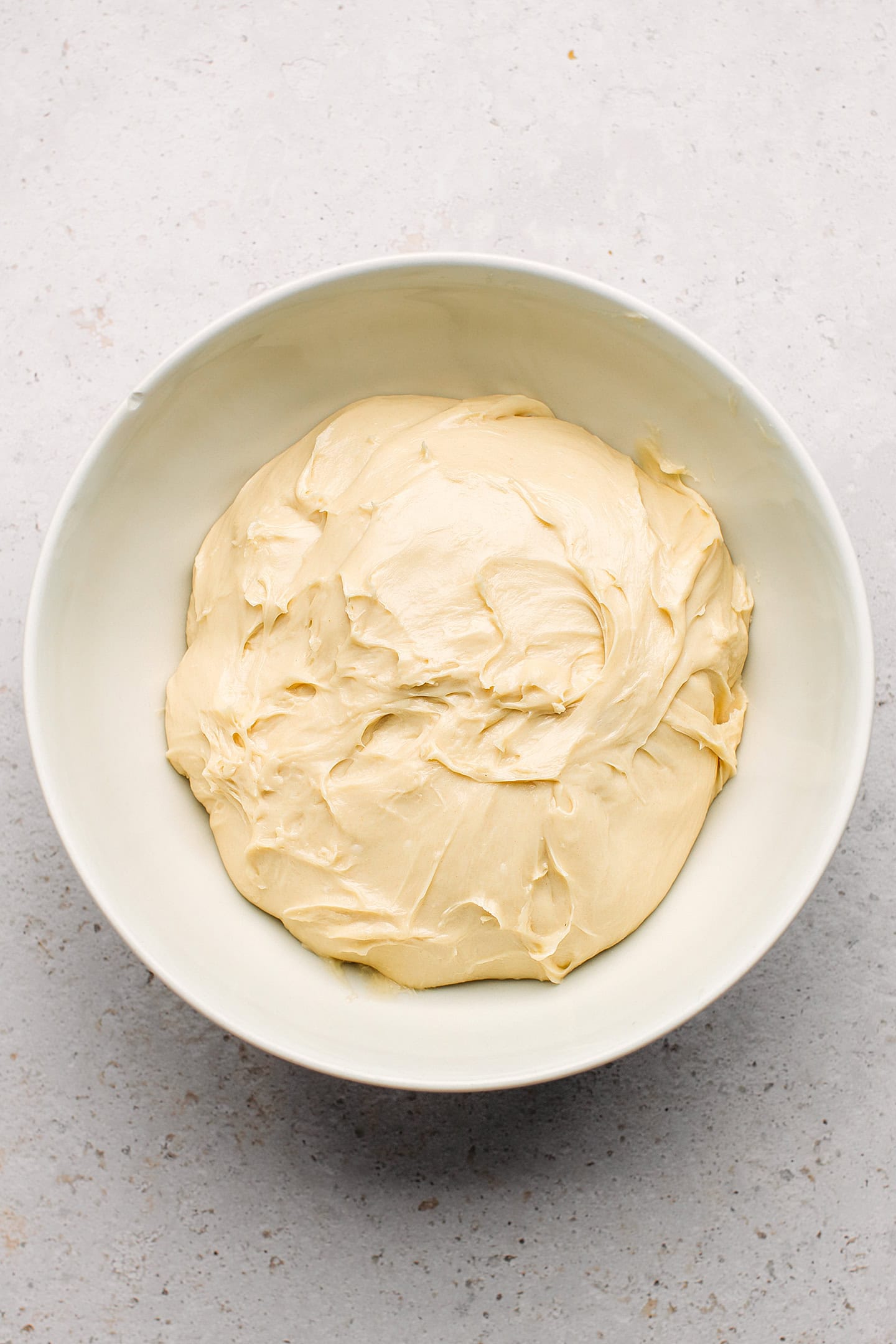 Dough in a mixing bowl.