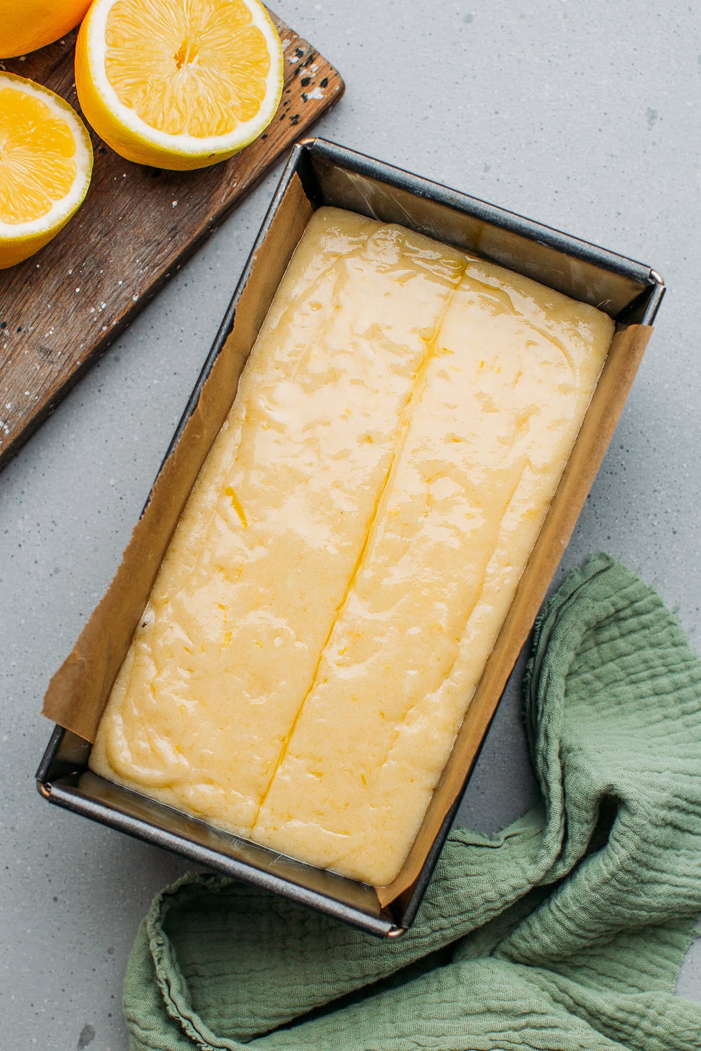 Lemon cake batter in a loaf pan.