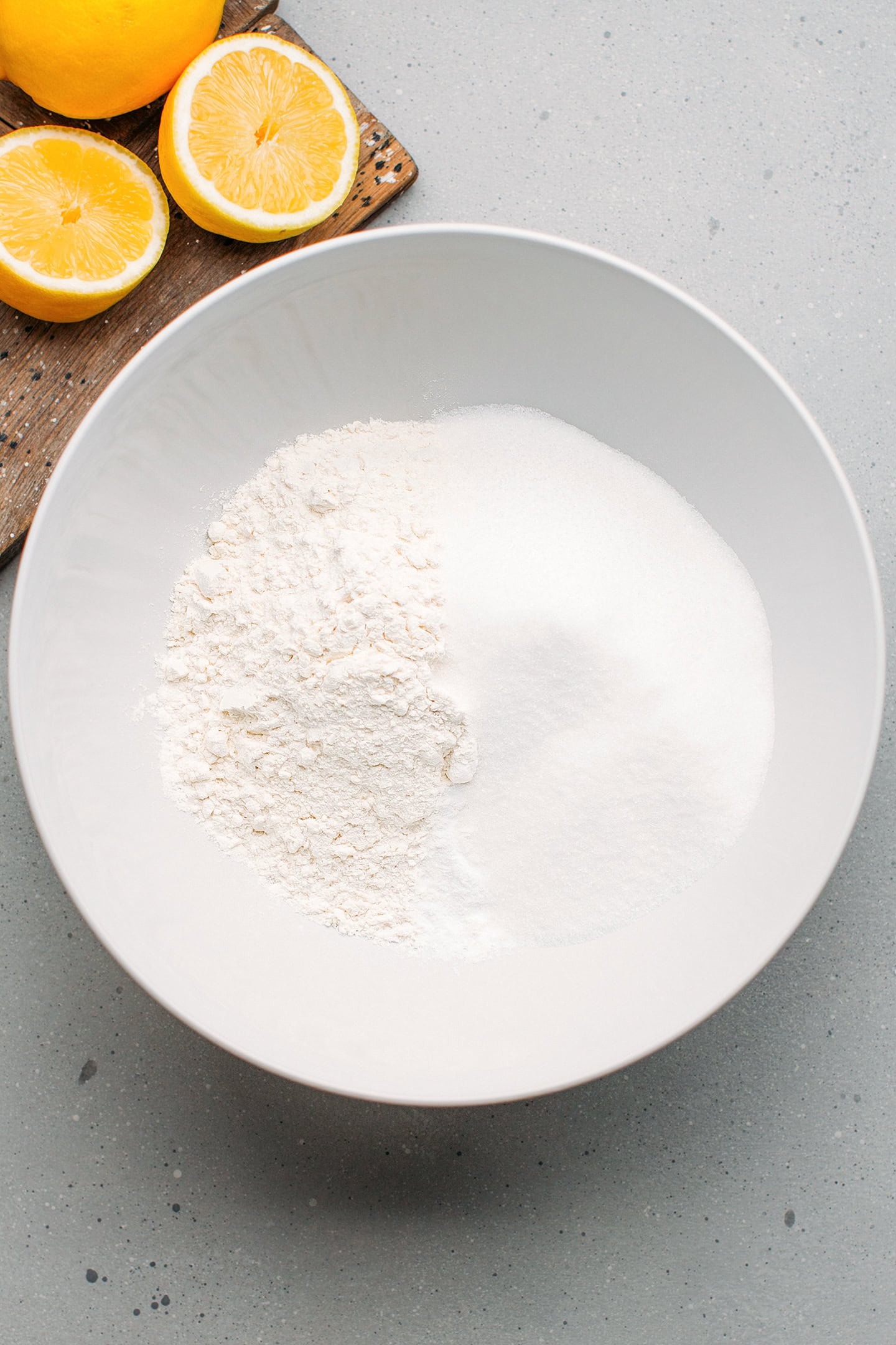 Flour and sugar in a mixing bowl.