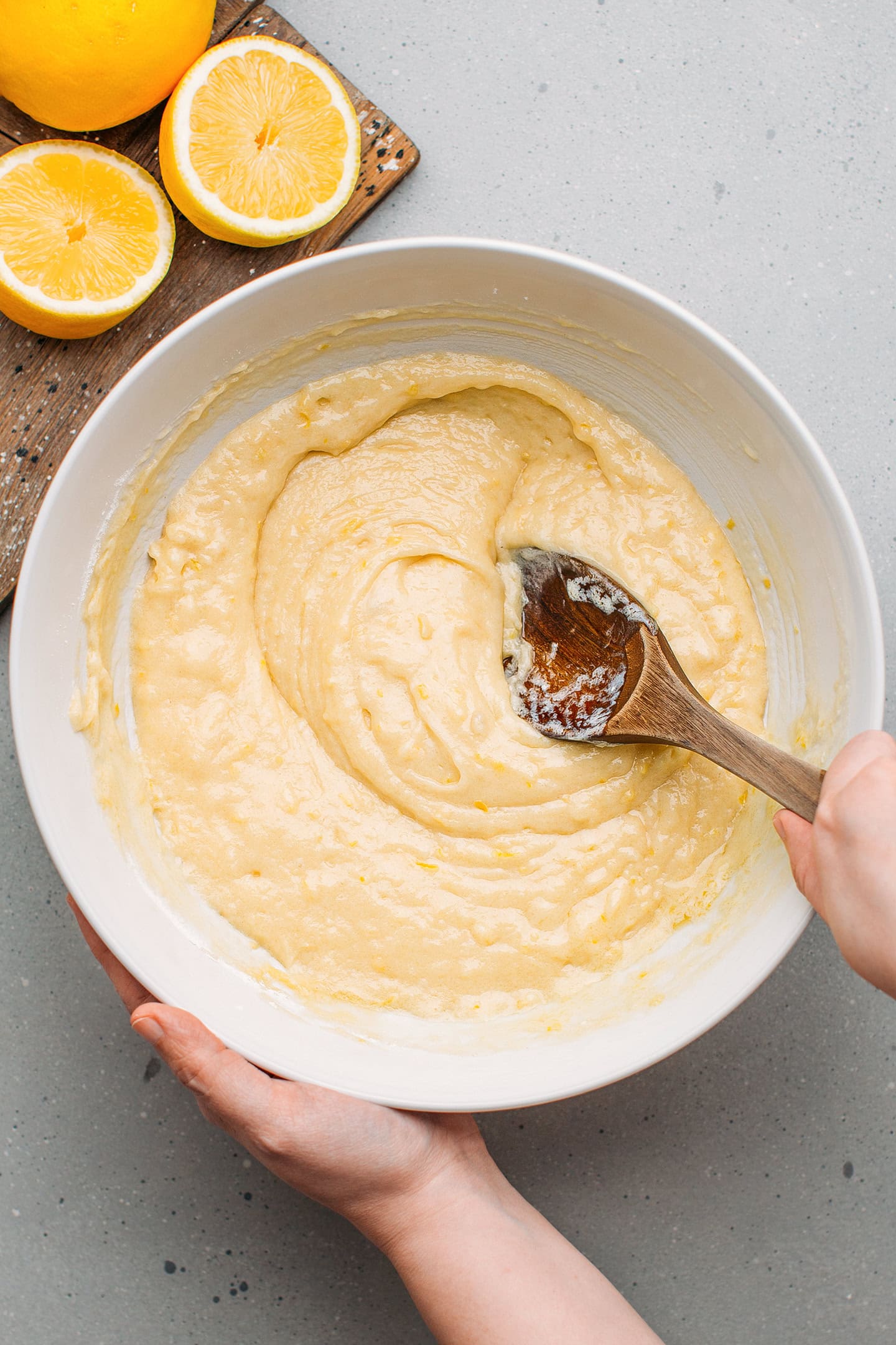 Mixing pound cake batter in a mixing bowl.