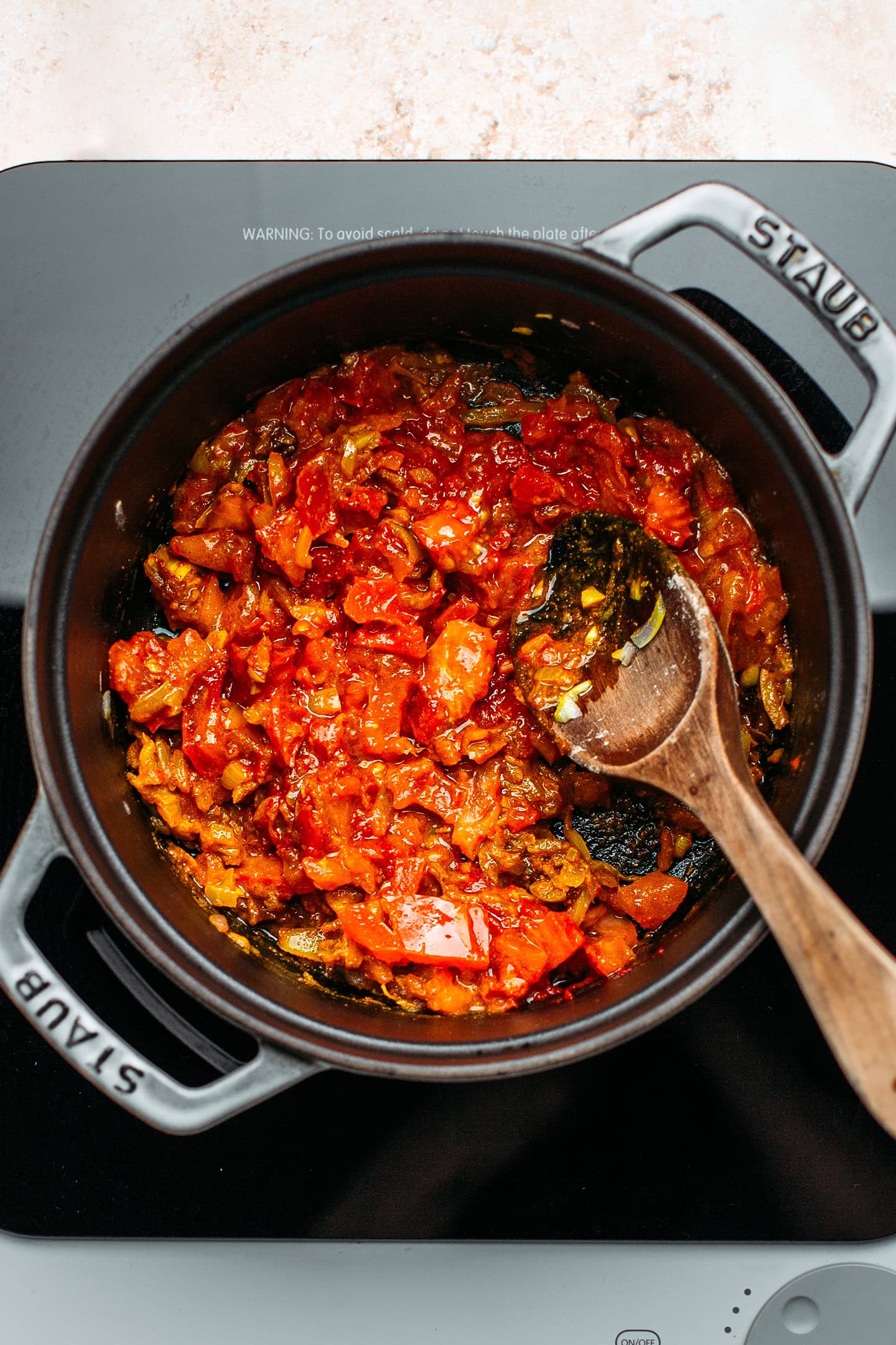 Diced tomatoes in a pot.