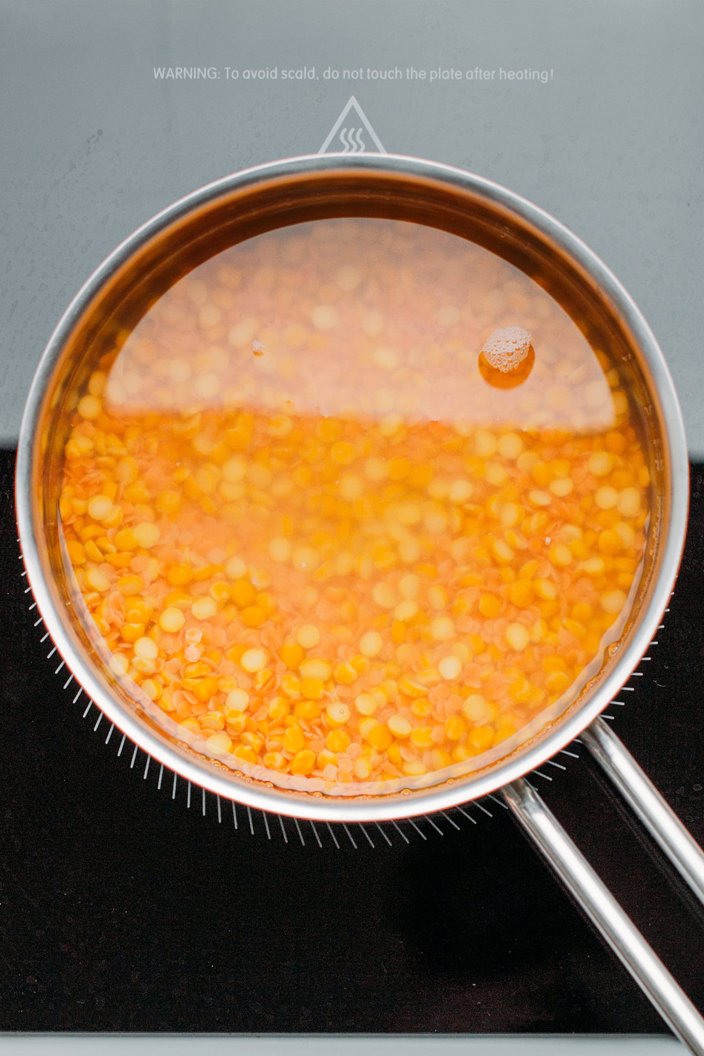 Chana dal and lentils in a saucepan.