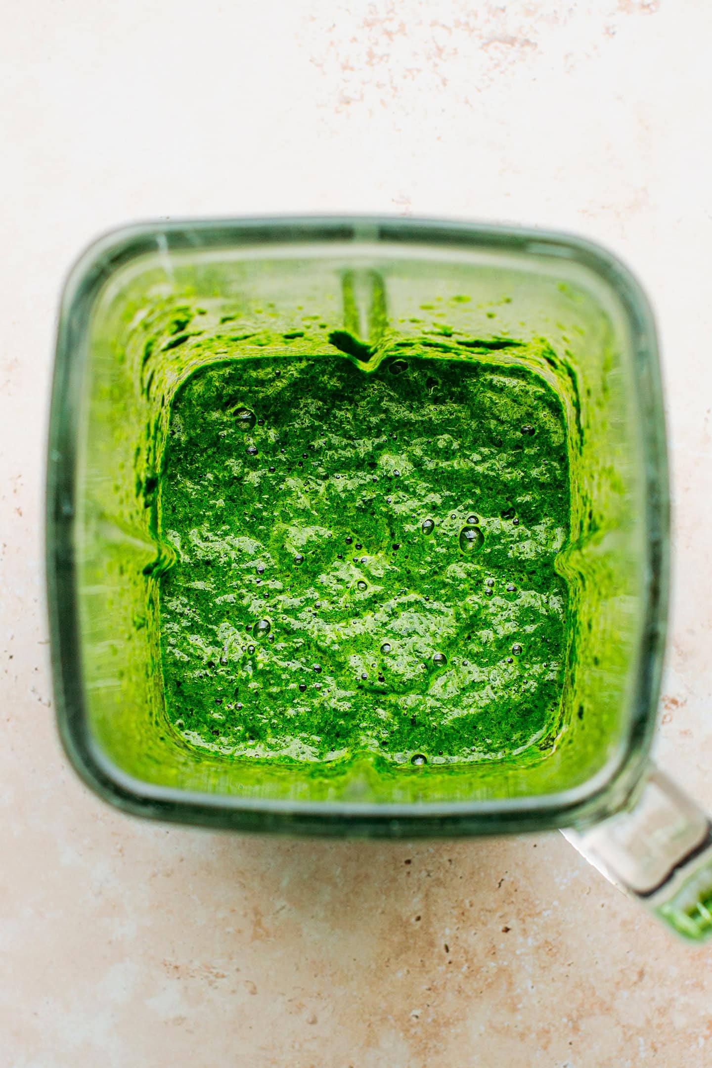 Blended spinach in a blender.