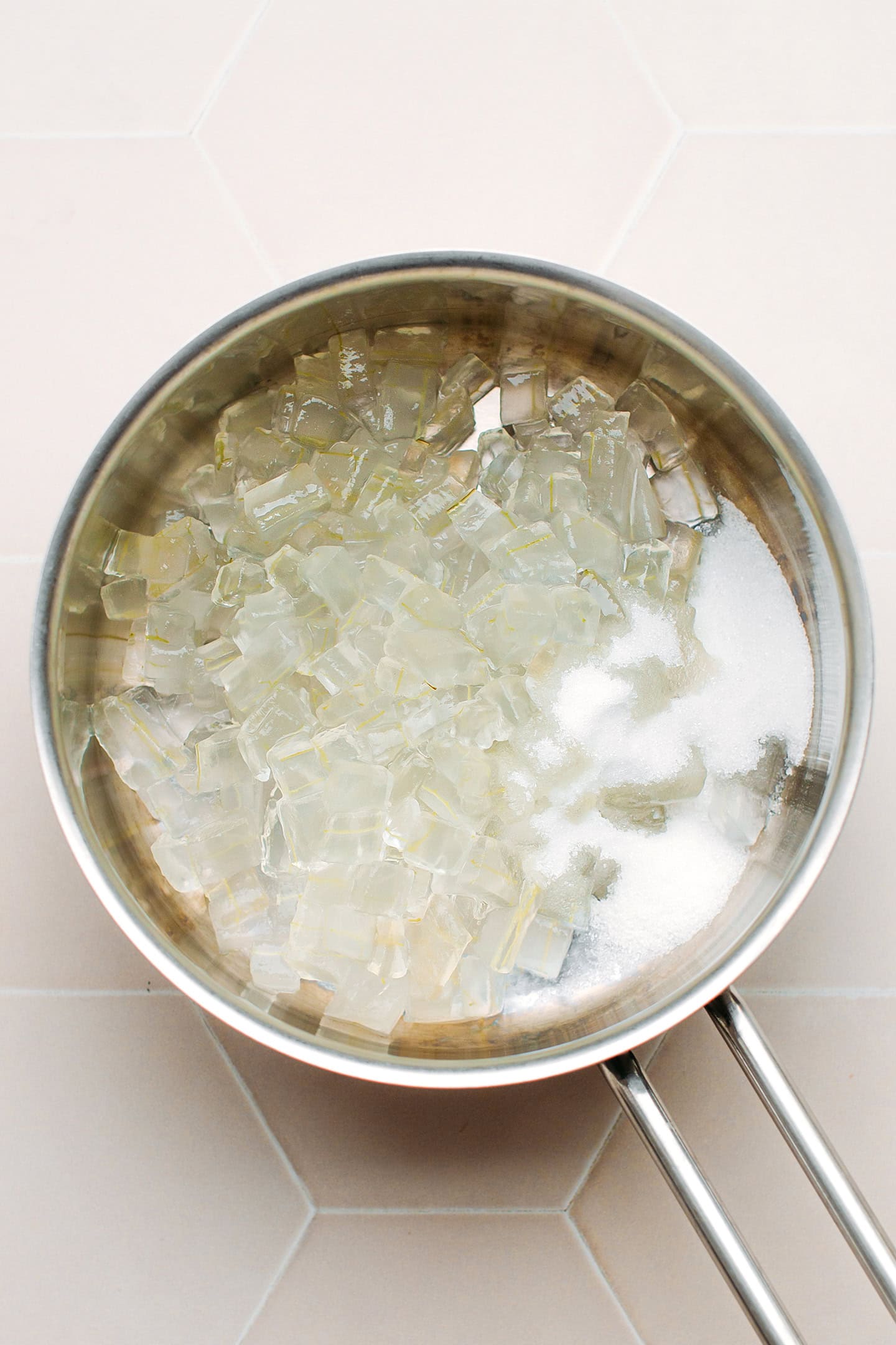 Cooked aloe vera and sugar in a pan.