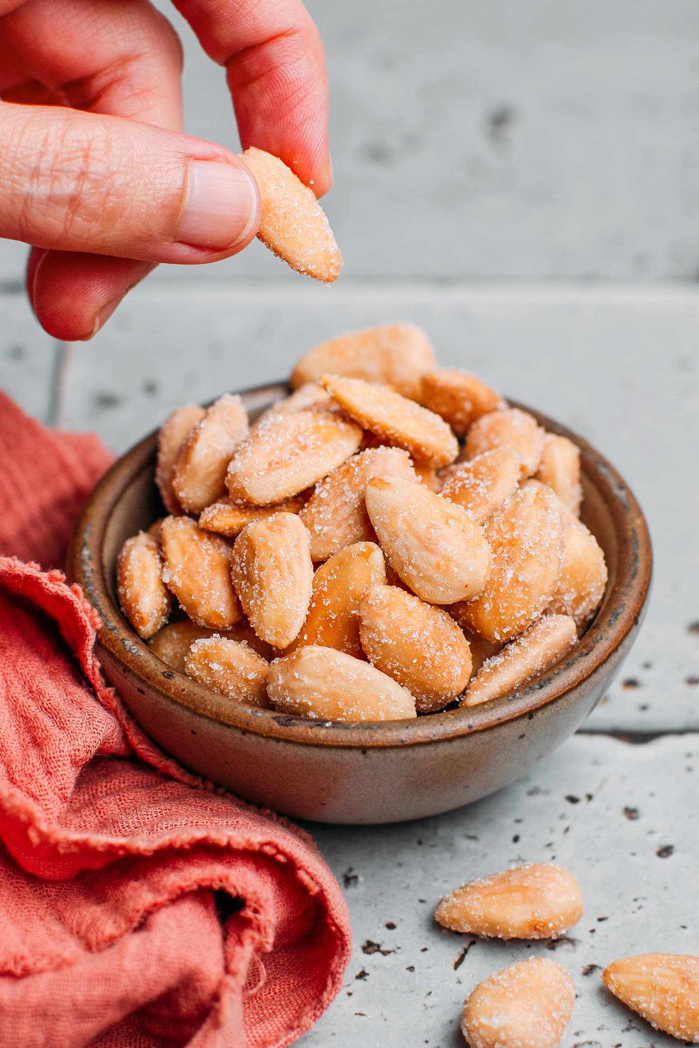 Small bowl filled with sweet and salty almonds