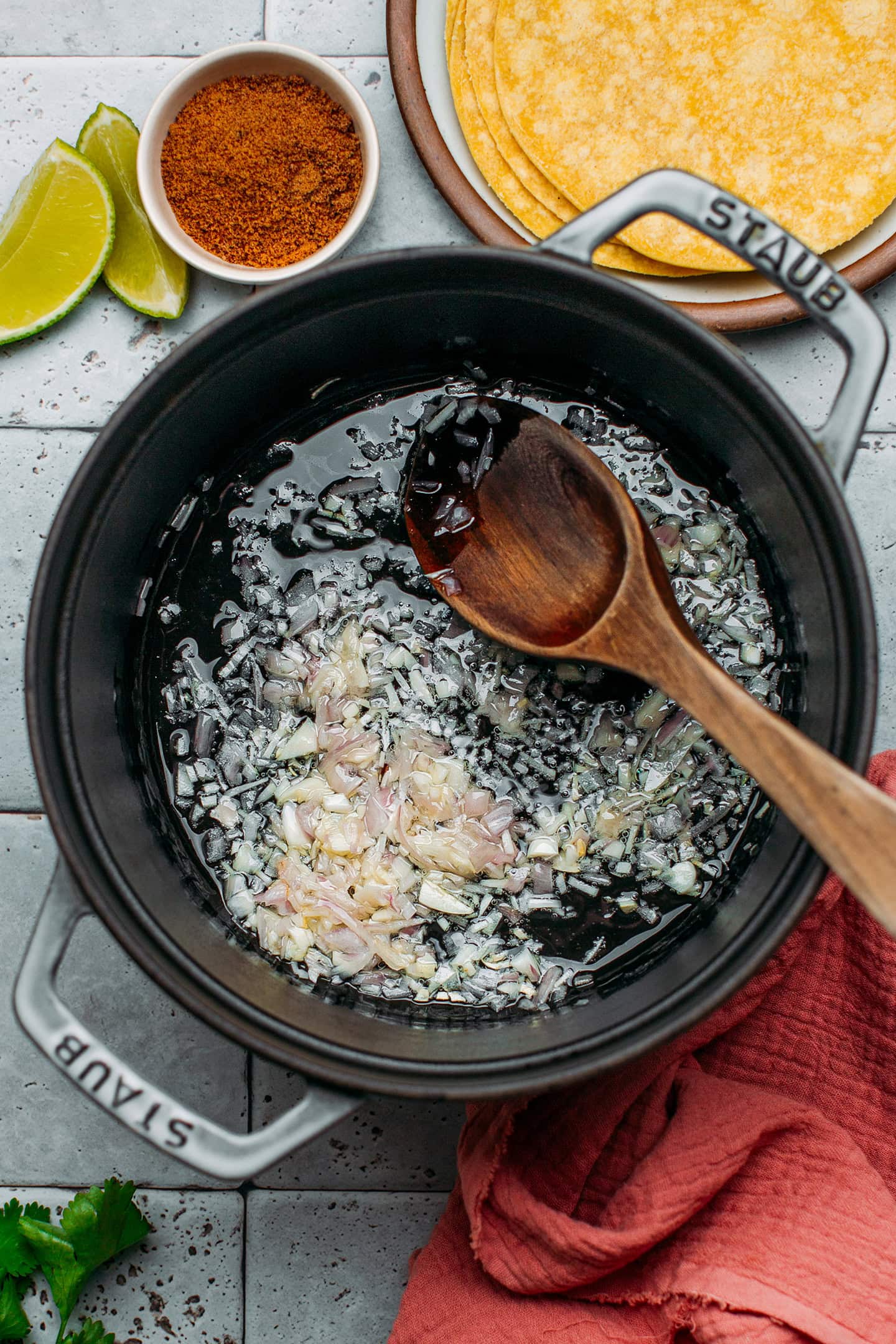 Sautéed garlic and shallots in a pot.