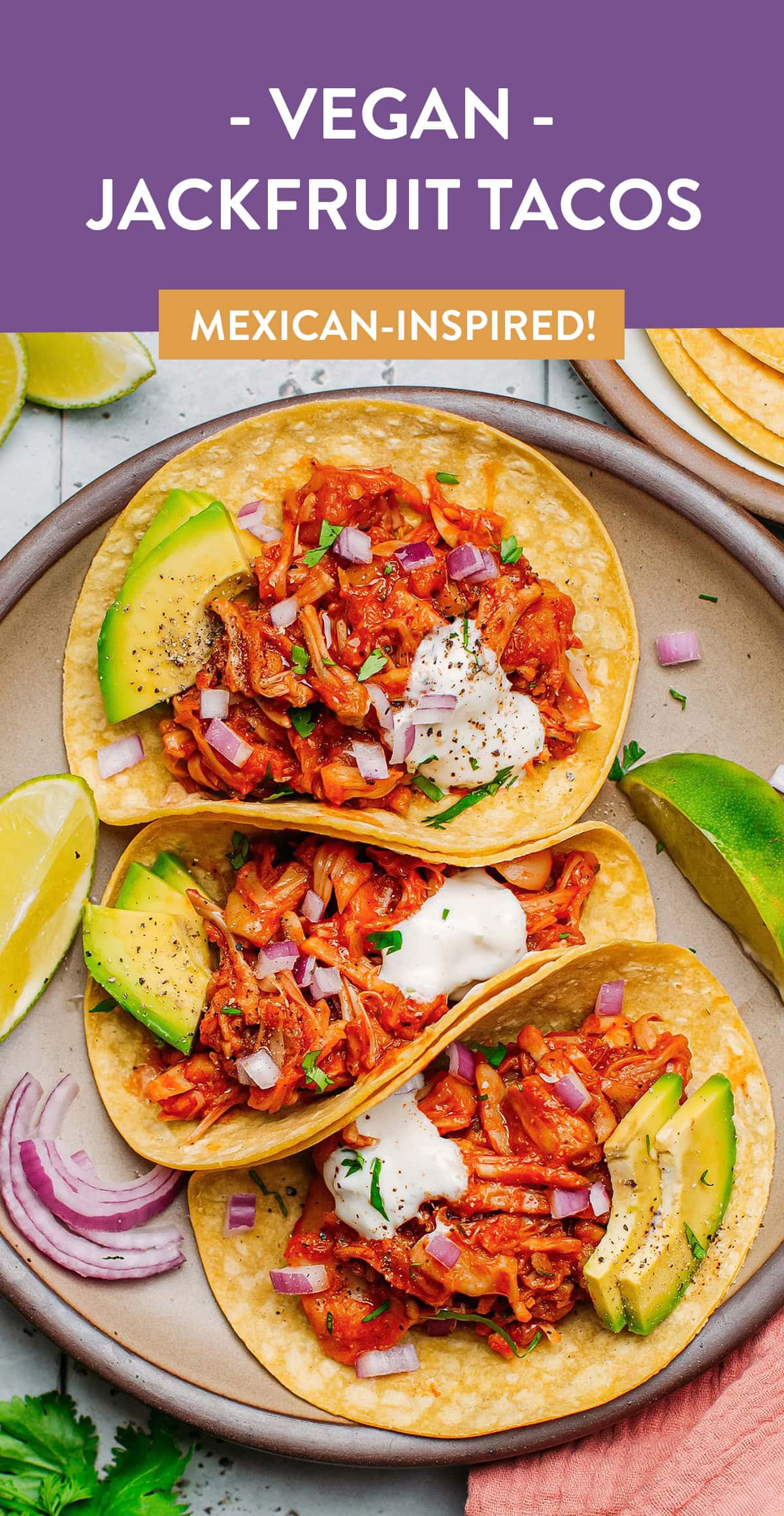 Vegan pulled jackfruit tacos topped with yogurt sauce.