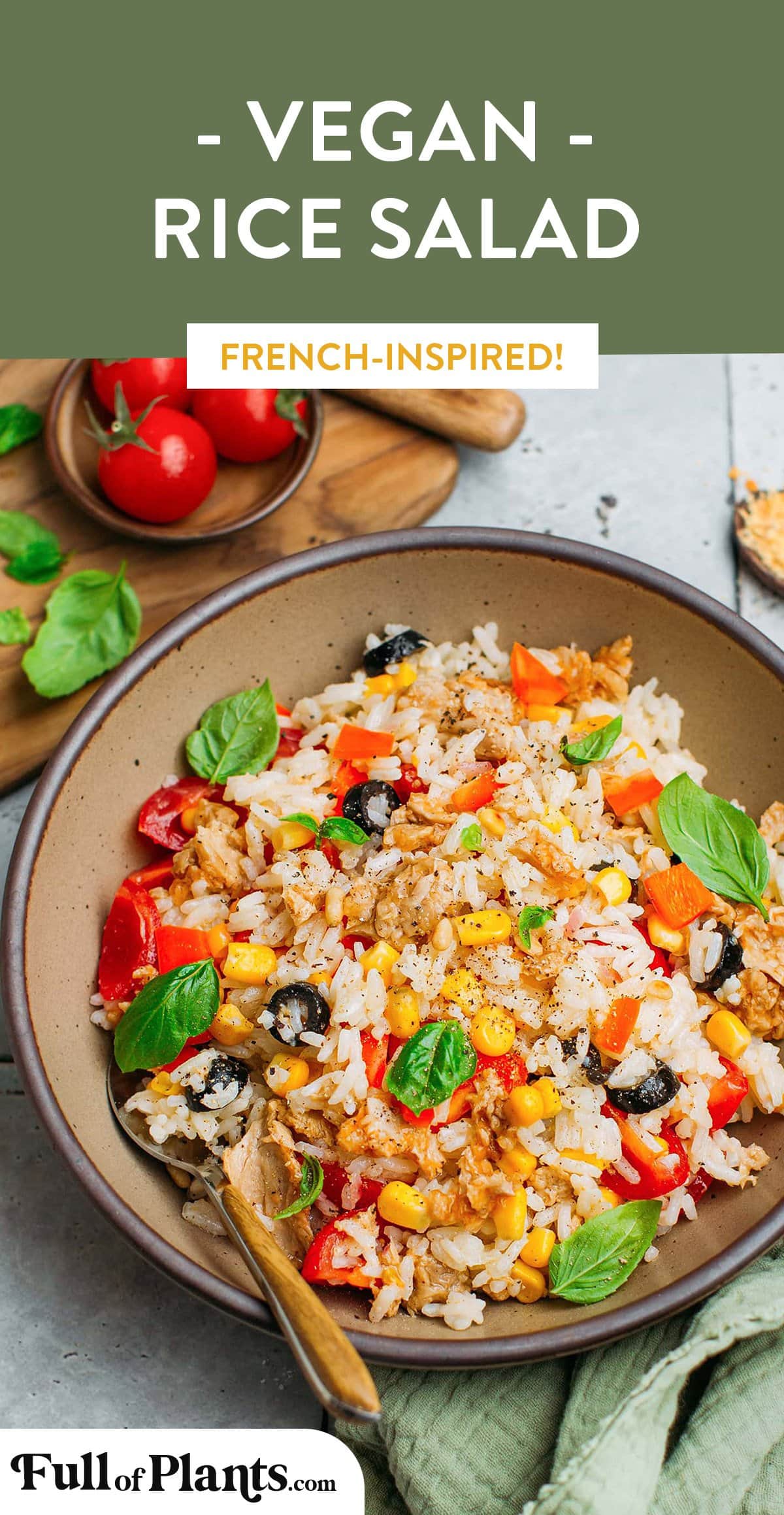 This French-inspired vegan rice salad is ideal for summer. It features vegan tuna, cherry tomatoes, corn, and black olives tossed with a bright and fruity vinaigrette. It's also incredibly versatile and a great way to use leftover rice! #ricesalad #salad #vegan