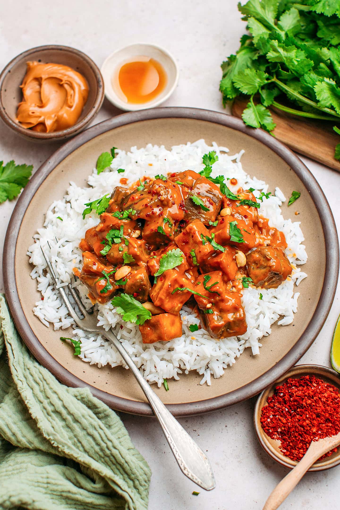 Tofu and eggplant tossed with satay sauce over a bed of rice.