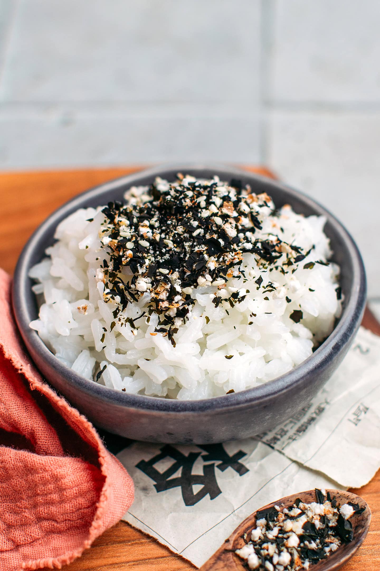 Bowl of rice topped with wakame furikake.