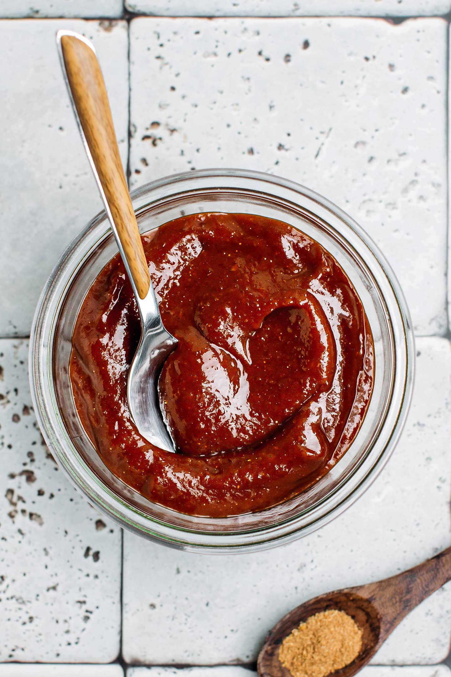 Homemade hoisin sauce in glass jar.