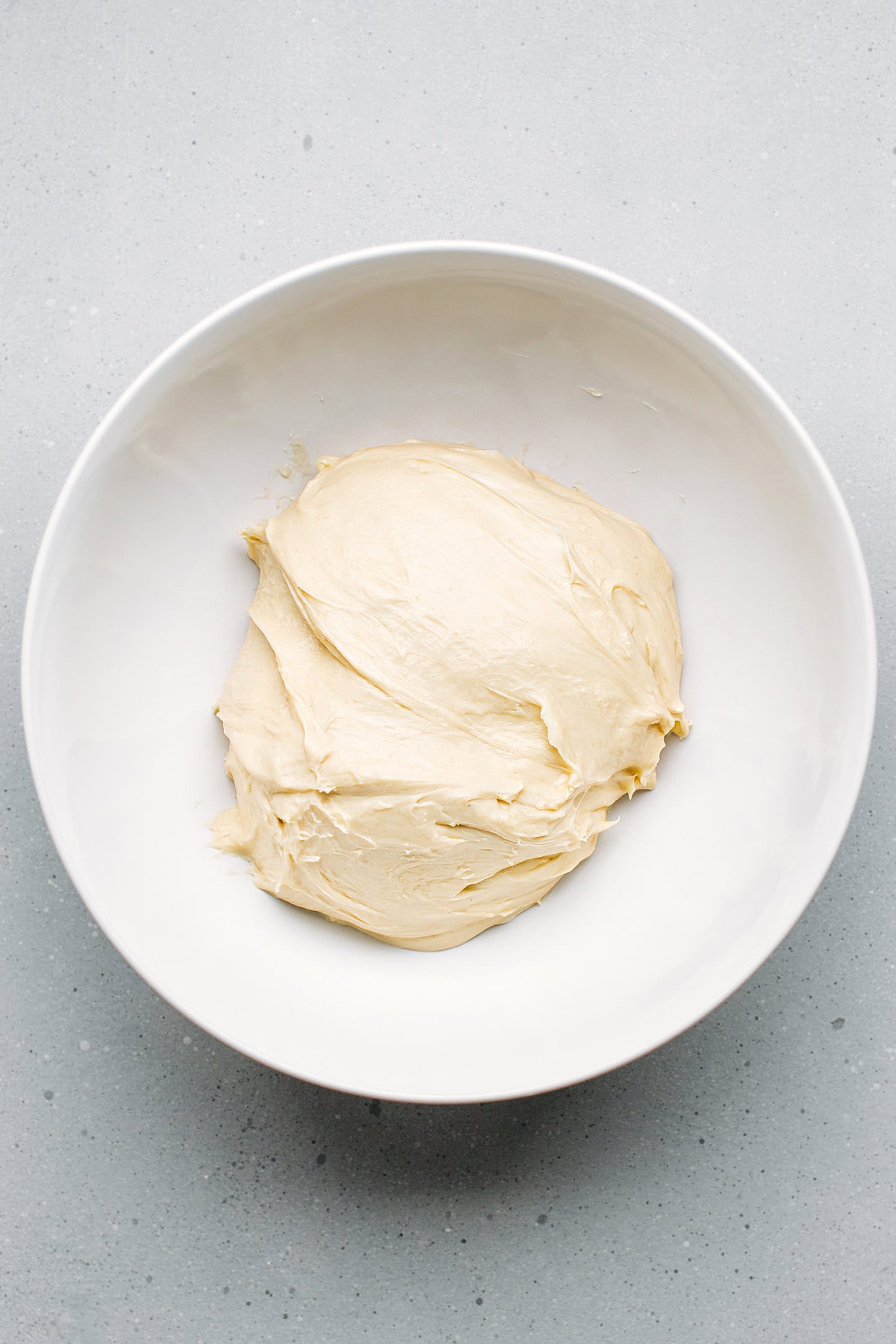 Brioche dough in a mixing bowl.