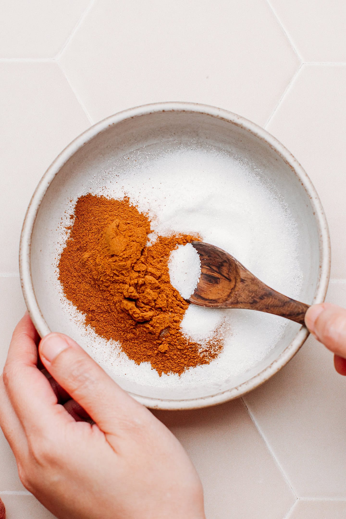 Sugar and cinnamon in a small bowl.