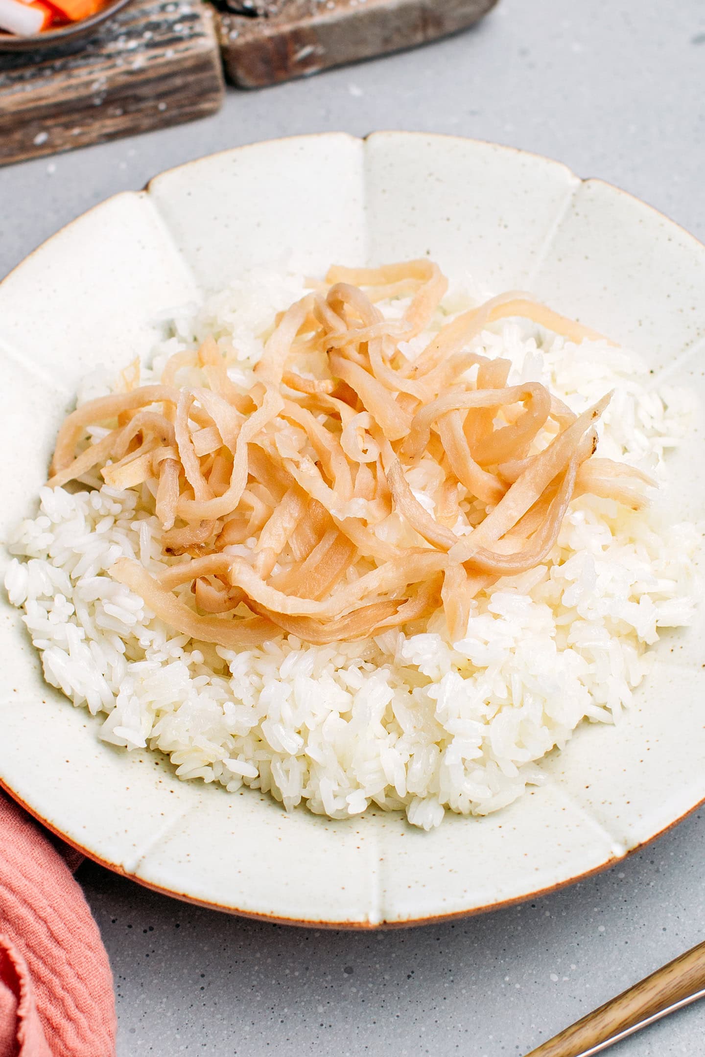 Preserved radish on top of sticky rice.