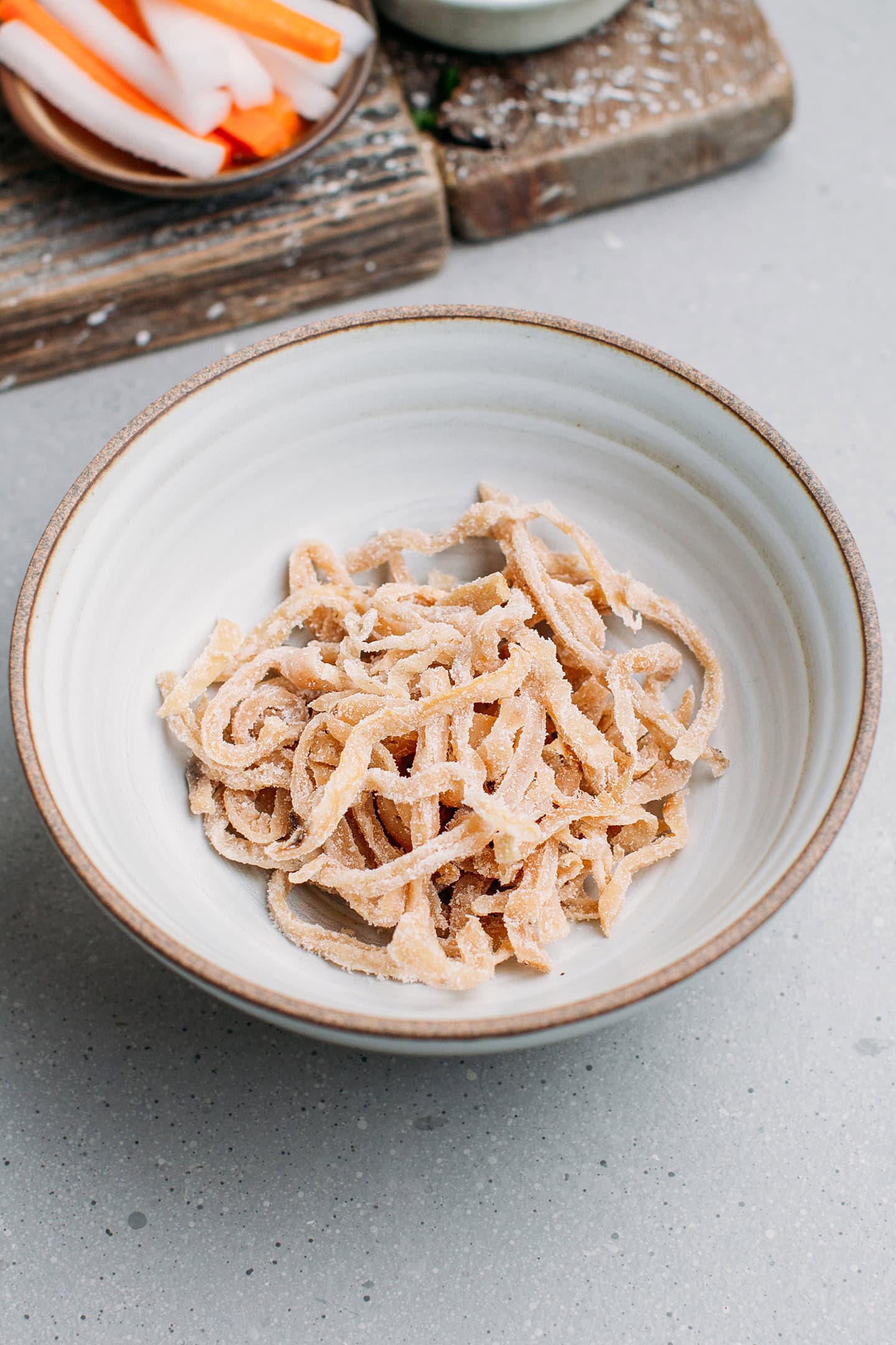 Chopped preserved radish in a bowl.