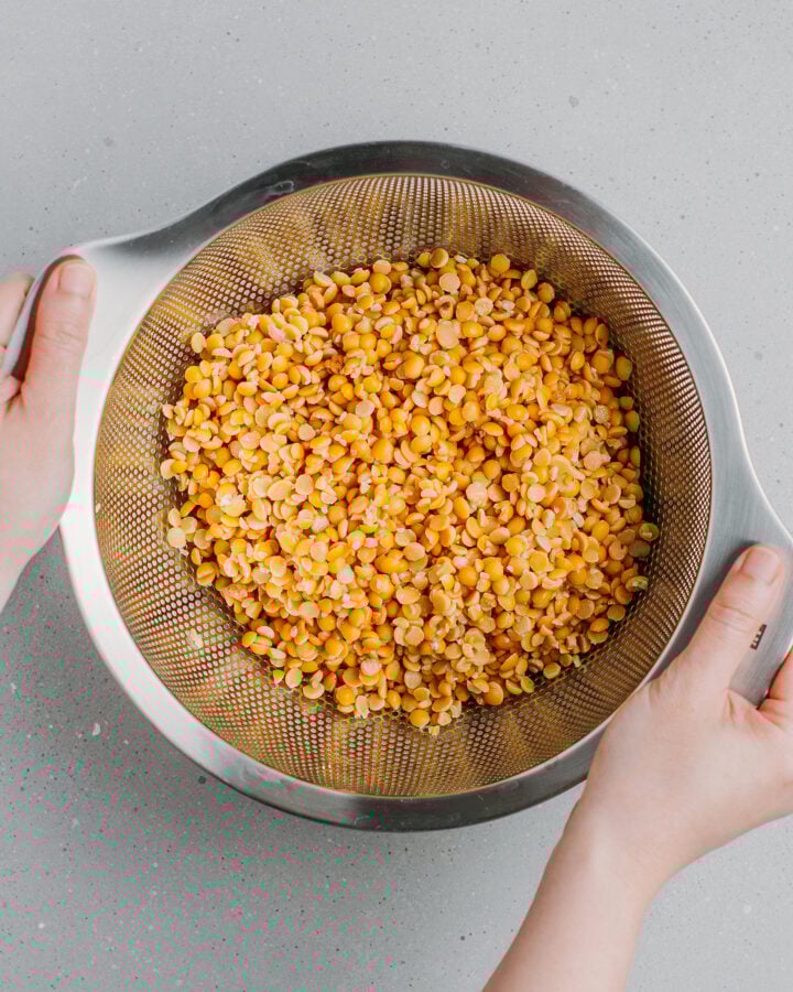 Draining soybeans using a colander.