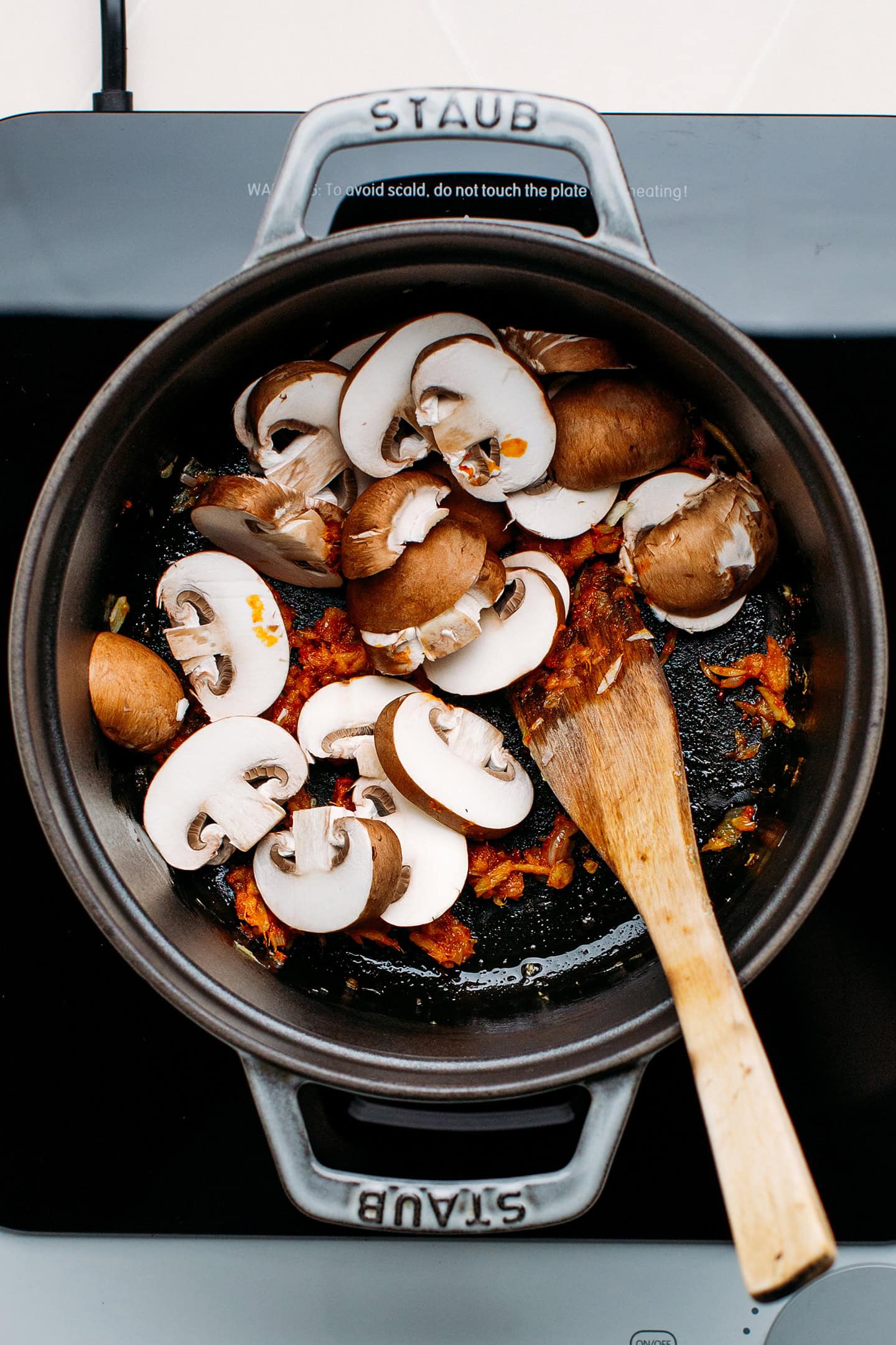 Sliced mushrooms in a pot.