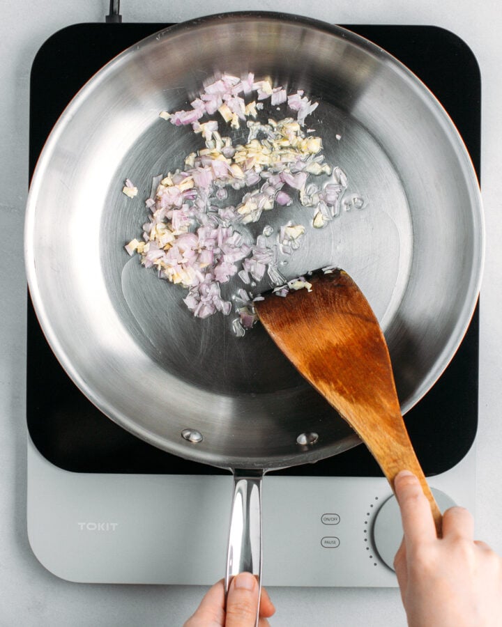 Chopped shallots and garlic in a skillet.