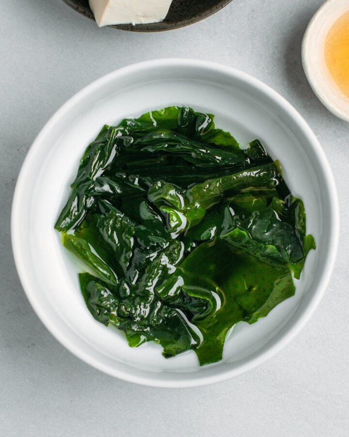 Rehydrated wakame in a small bowl.