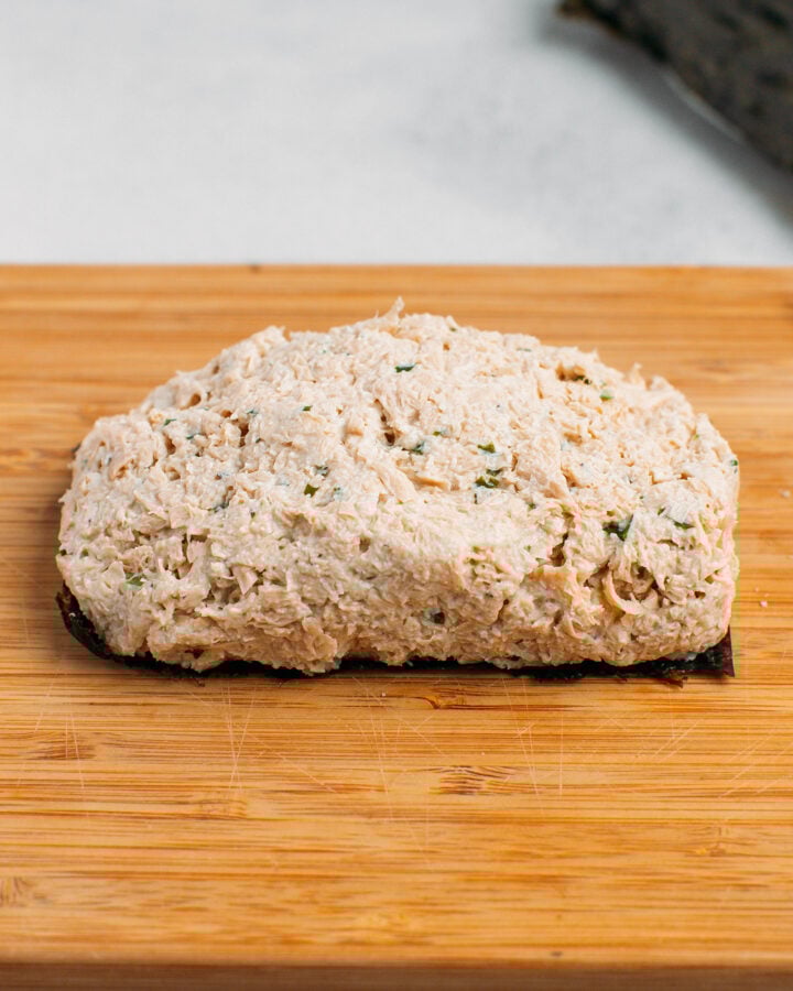 Uncooked vegan fish on a cutting board.