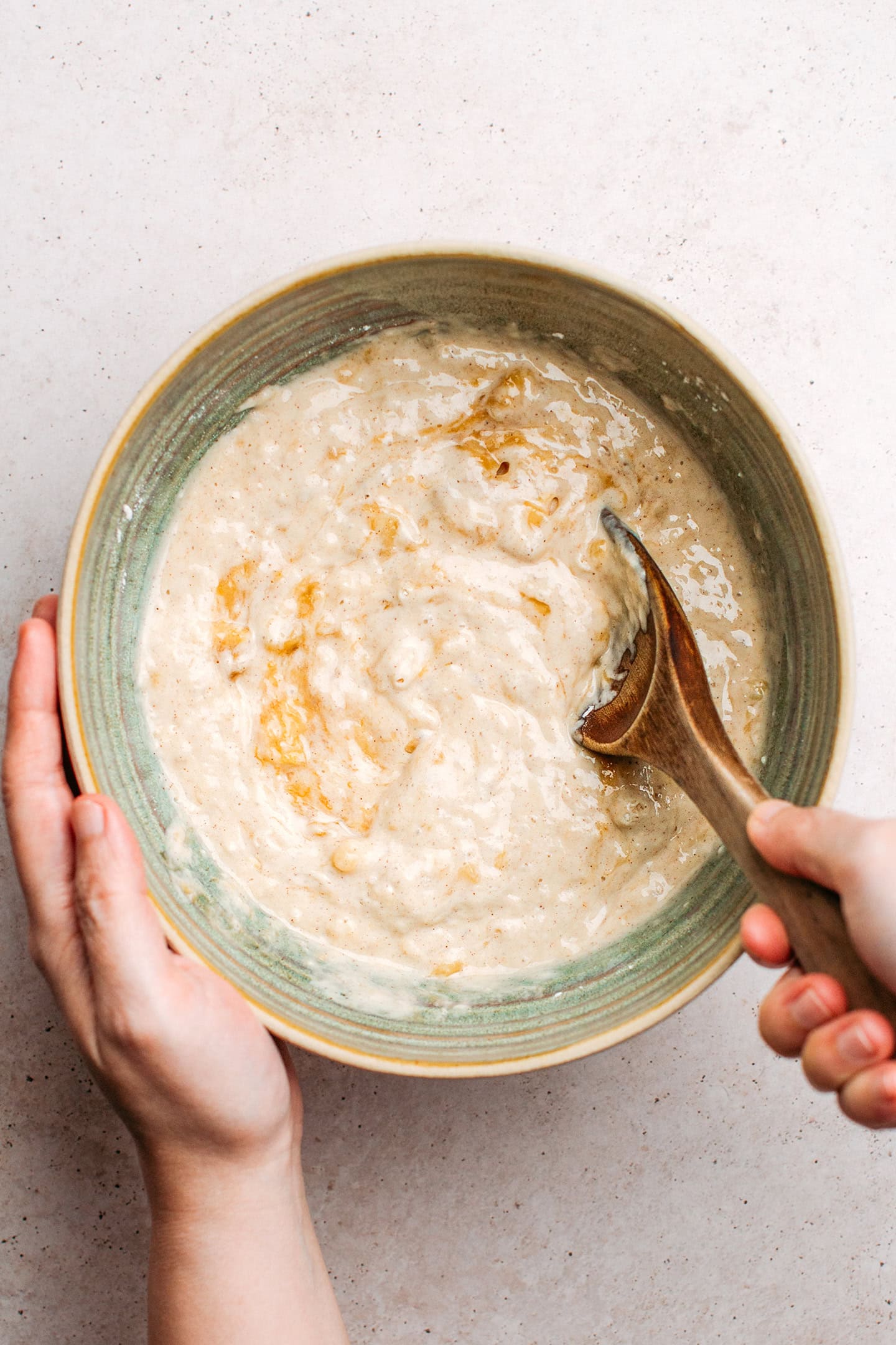 Banana pancake batter in a bowl.