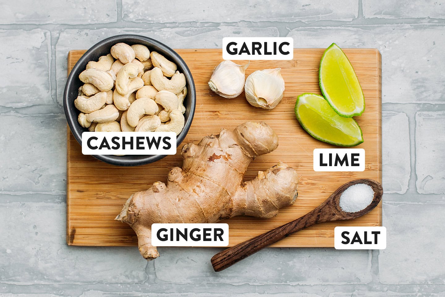 Ingredients like cashews, ginger, garlic, and lime.