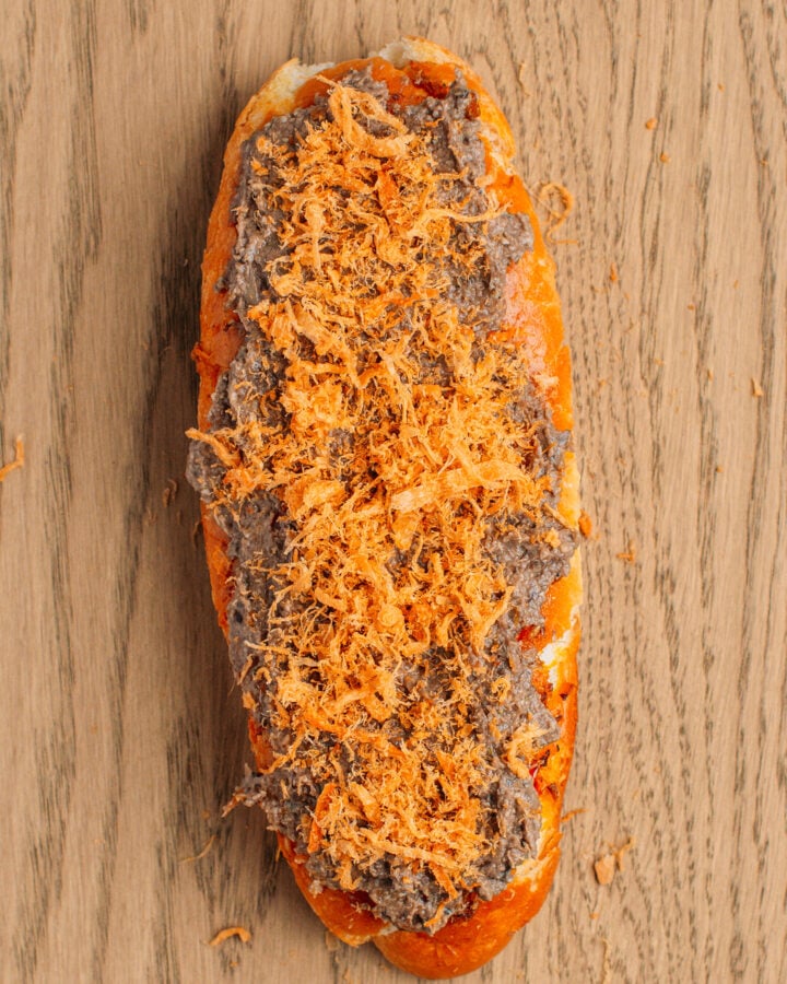 Banh mi topped with pâté and vegan meat floss.