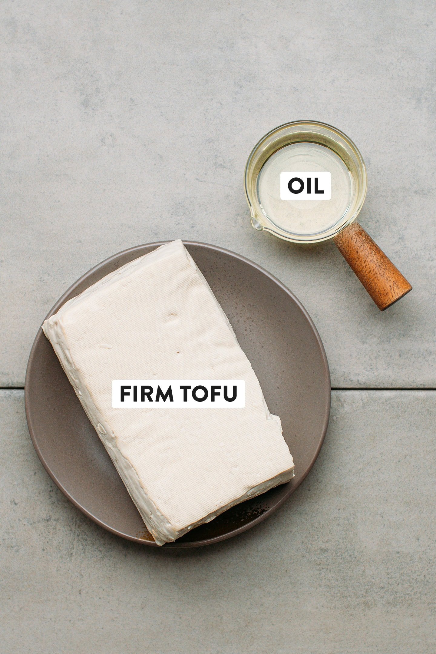 Ingredients like firm tofu and oil.