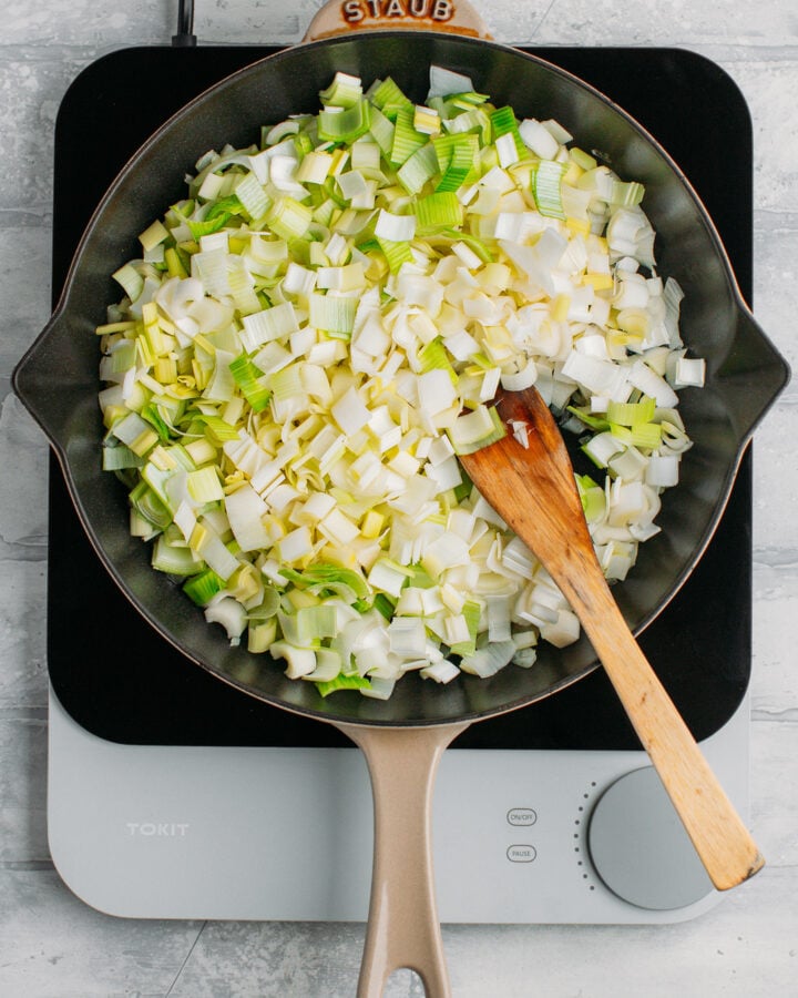 Chopped leeks in a skillet.