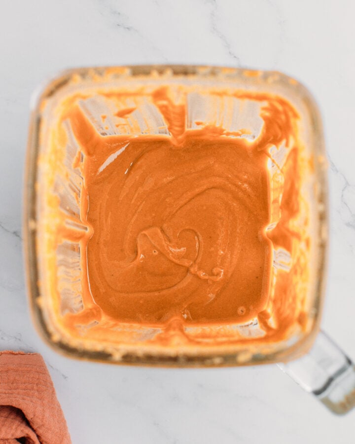 Smooth almond butter in a blender.