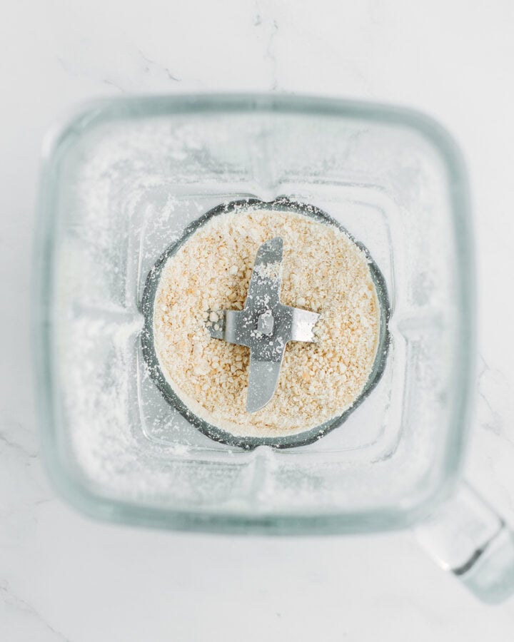 Ground cashews in a blender.