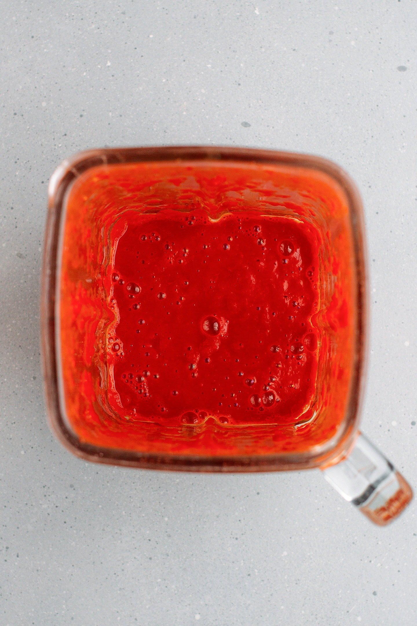 Blended cayenne peppers with vinegar.