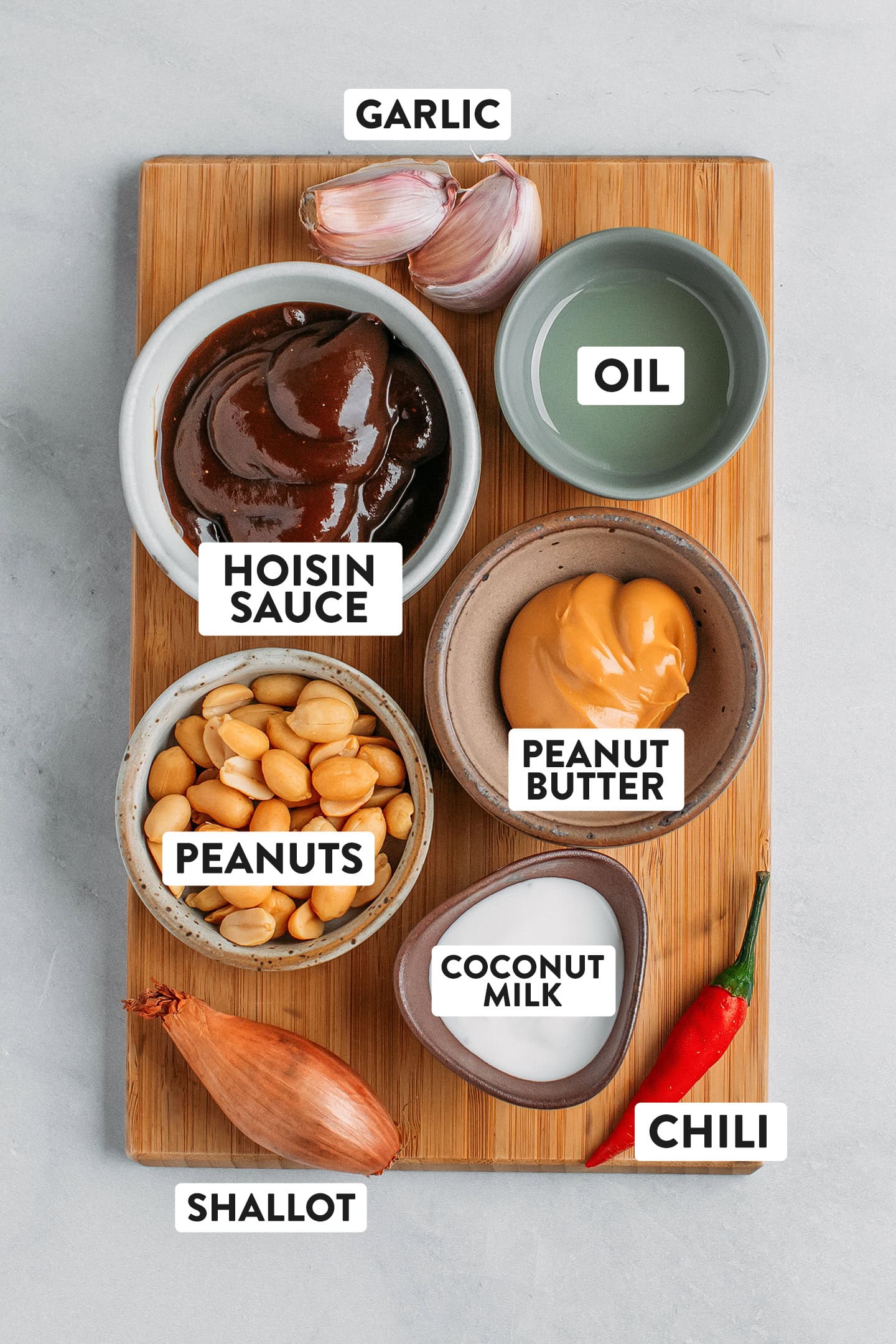 Ingredients like hoisin sauce, peanut butter, coconut milk, shallot, and garlic.