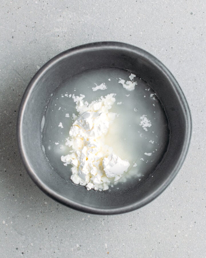 Cornstarch and water in a small bowl.